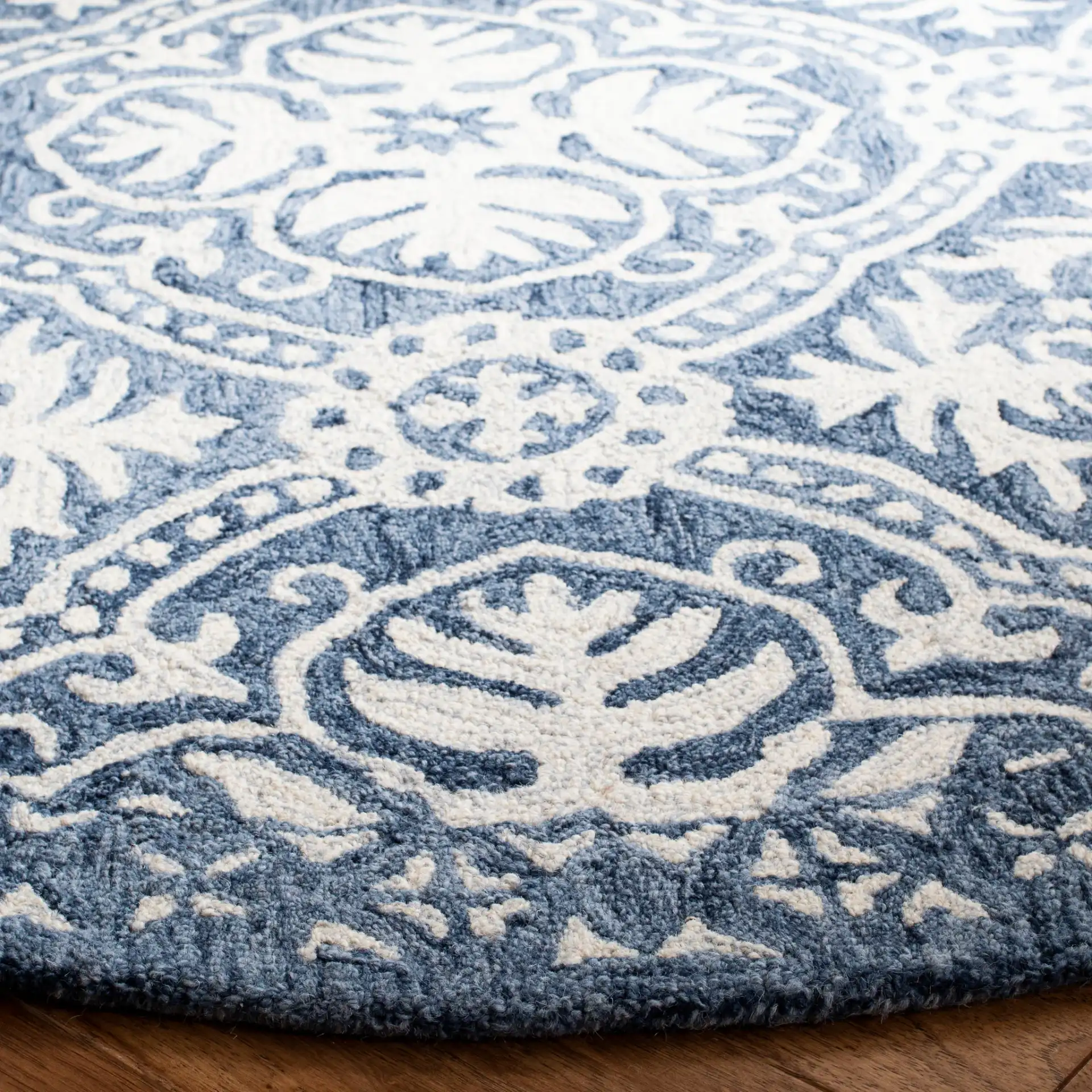 Micro-Loop Floral Tile Hand-Tufted Wool Rug in Blue / Ivory in a styled room