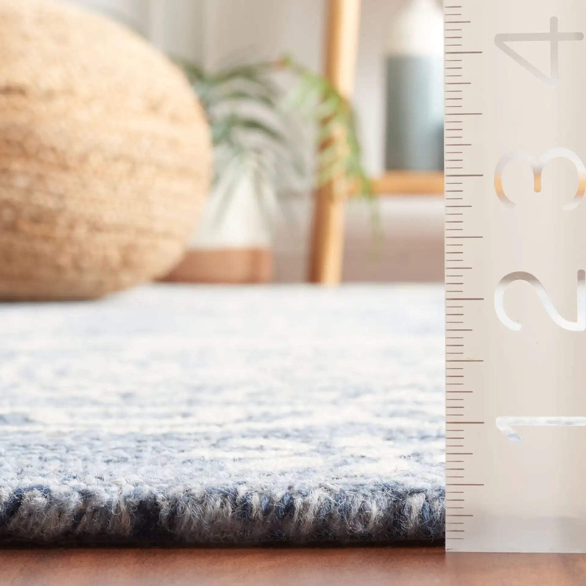 Micro-Loop Banded Medallion Hand-Tufted Wool Rug in Blue / Ivory in a styled room
