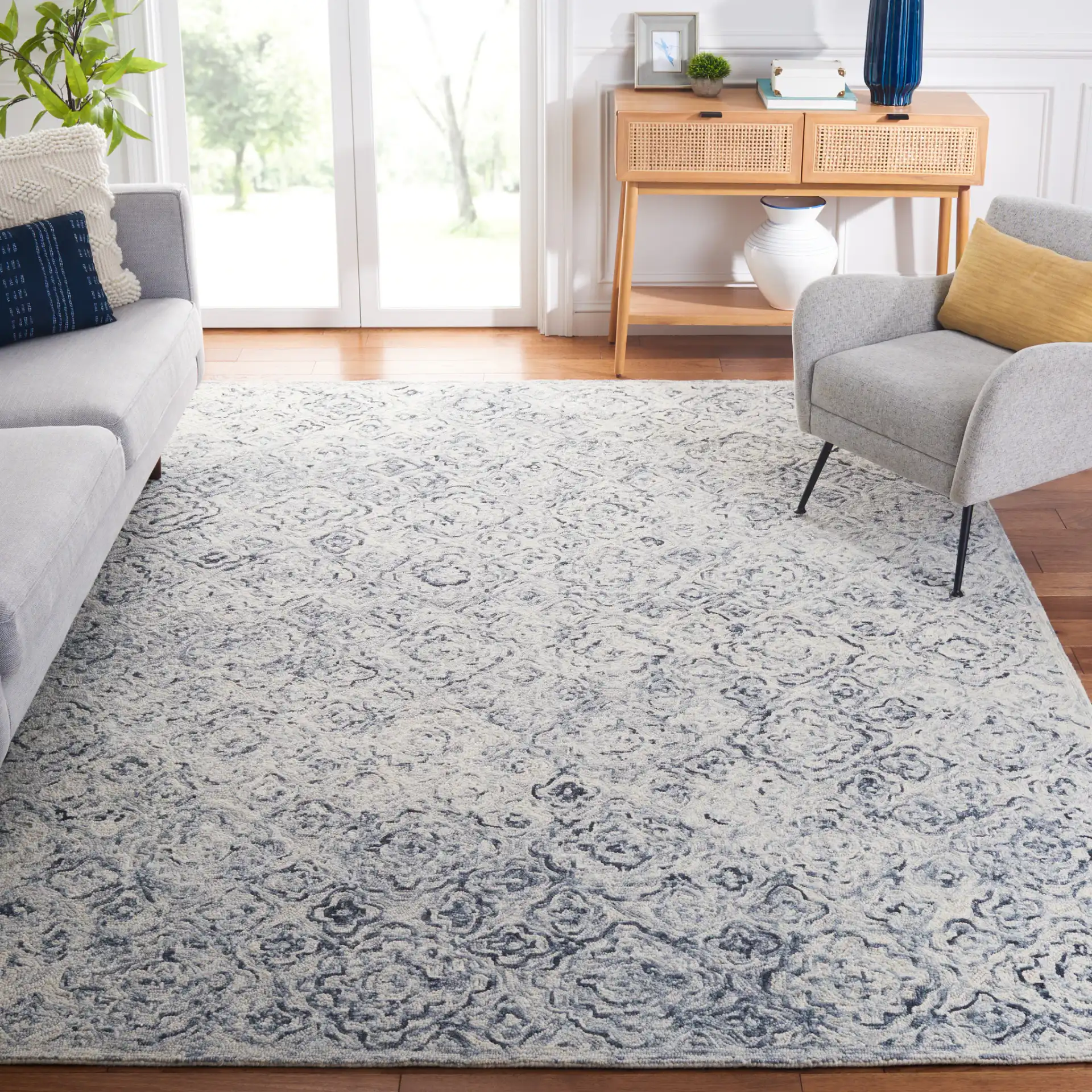 Micro-Loop Tile Lattice Hand-Tufted Wool Rug in Gray / Beige in a styled room