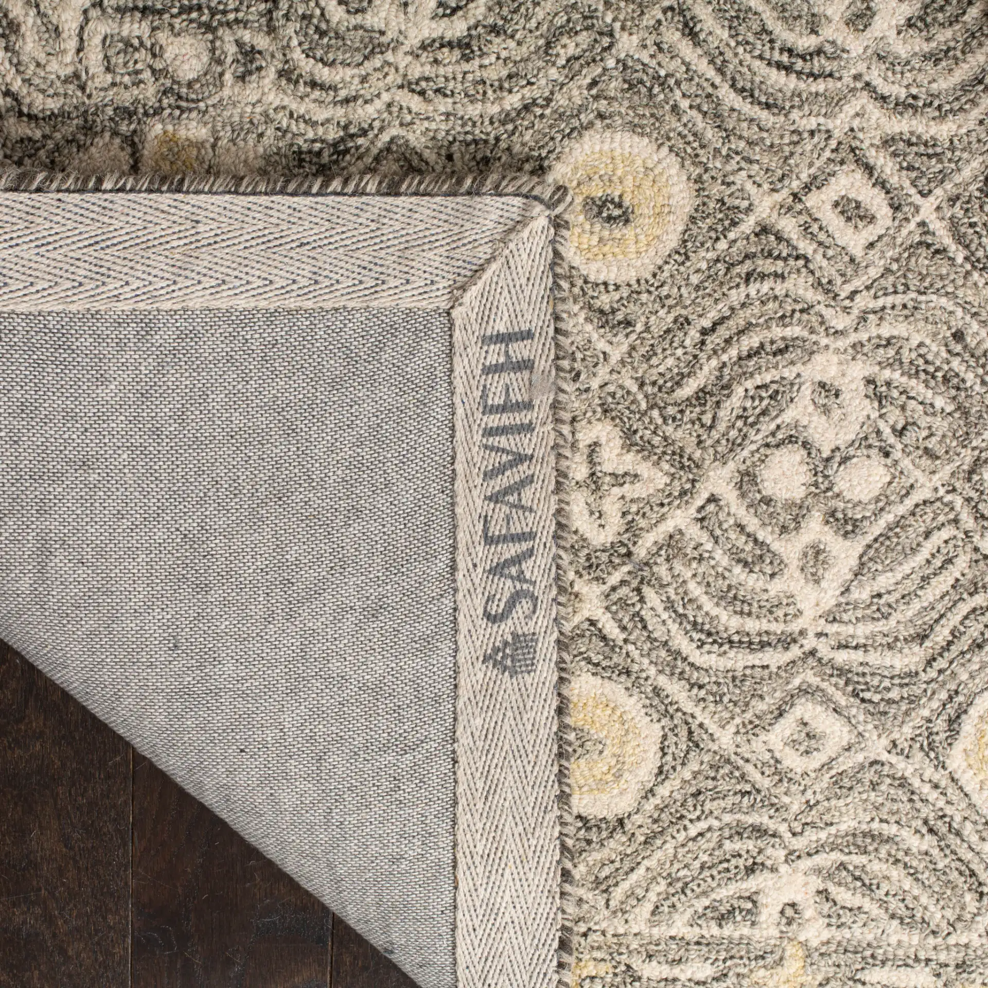 Micro-Loop Mosaic Hand-Tufted Wool Rug in Charcoal / Ivory in a styled room