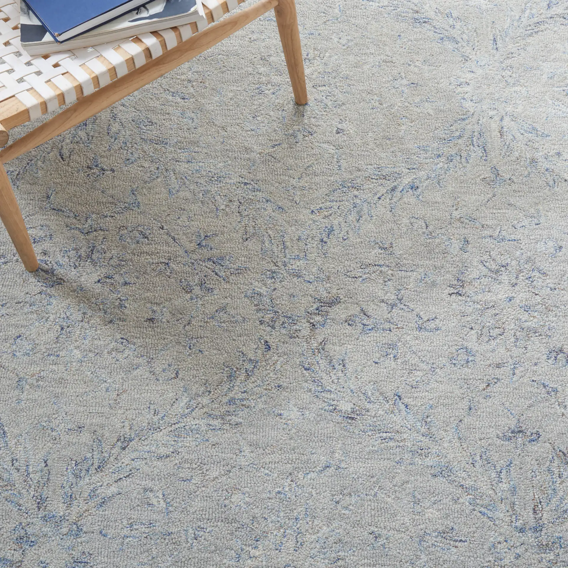 Micro-Loop Botanical Trellis Hand-Tufted Wool Rug in Gray / Blue in a styled room