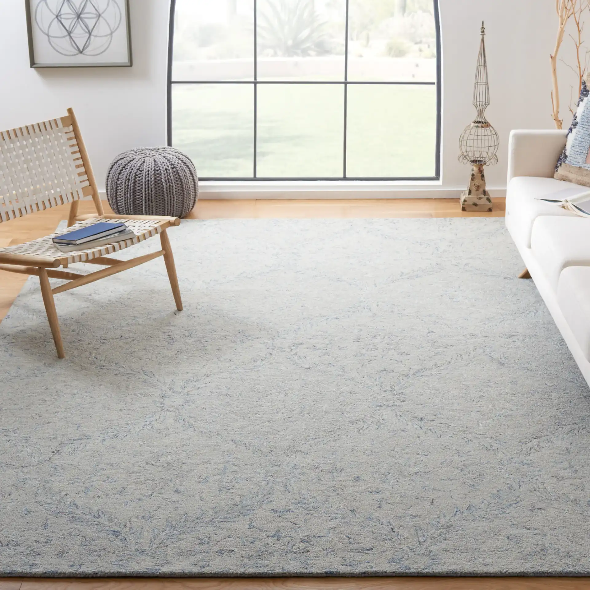 Micro-Loop Botanical Trellis Hand-Tufted Wool Rug in Gray / Blue in a styled room
