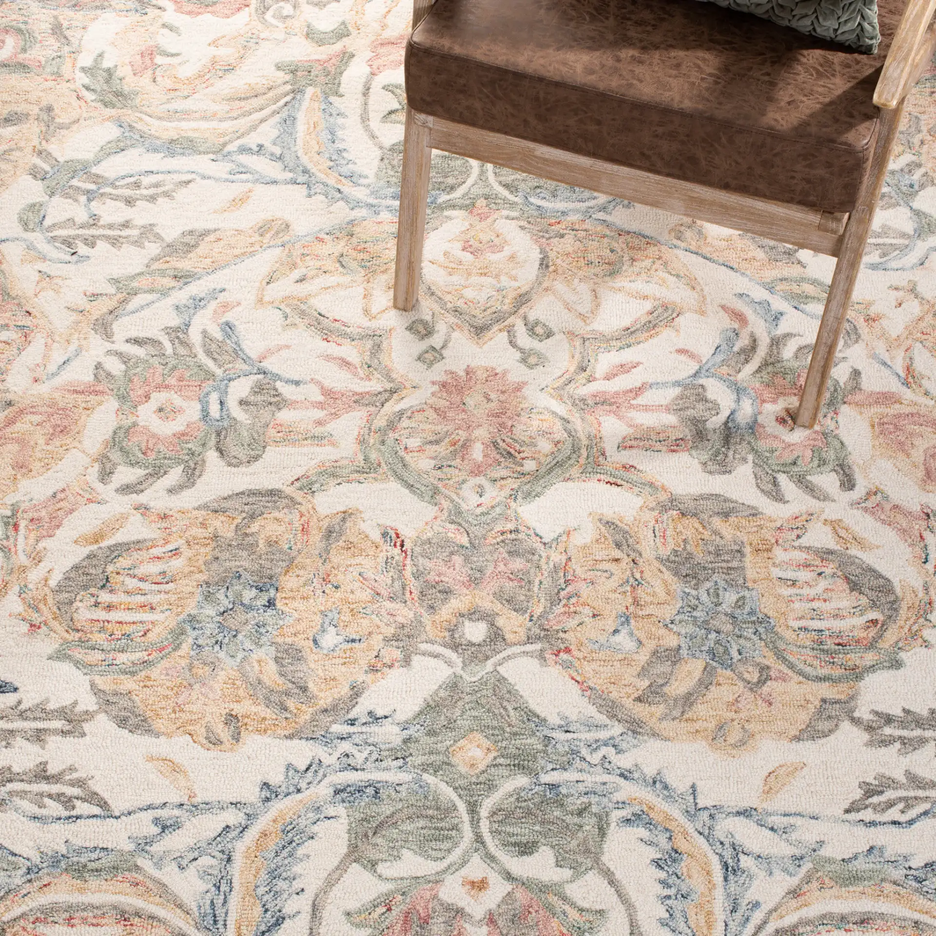 Micro-Loop Botanical Border Hand-Tufted Wool Rug in Ivory / Blue in a styled room
