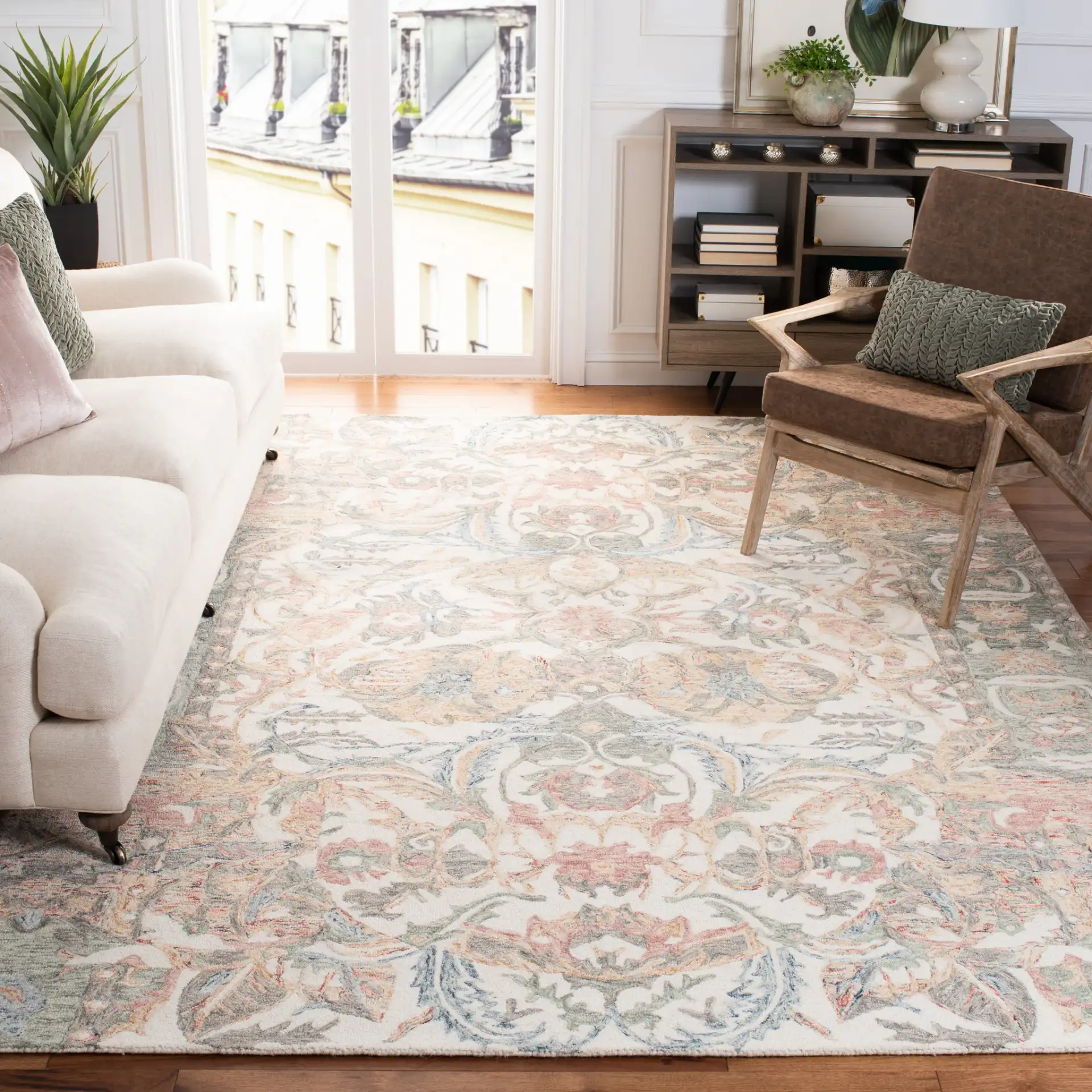 Micro-Loop Botanical Border Hand-Tufted Wool Rug in Ivory / Blue in a styled room