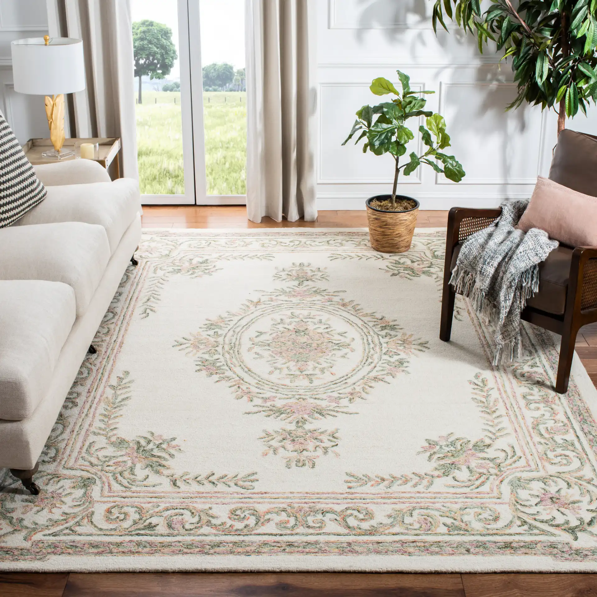 Micro-Loop Oval Medallion Hand-Tufted Wool Rug in Ivory / Fuchsia in a styled room