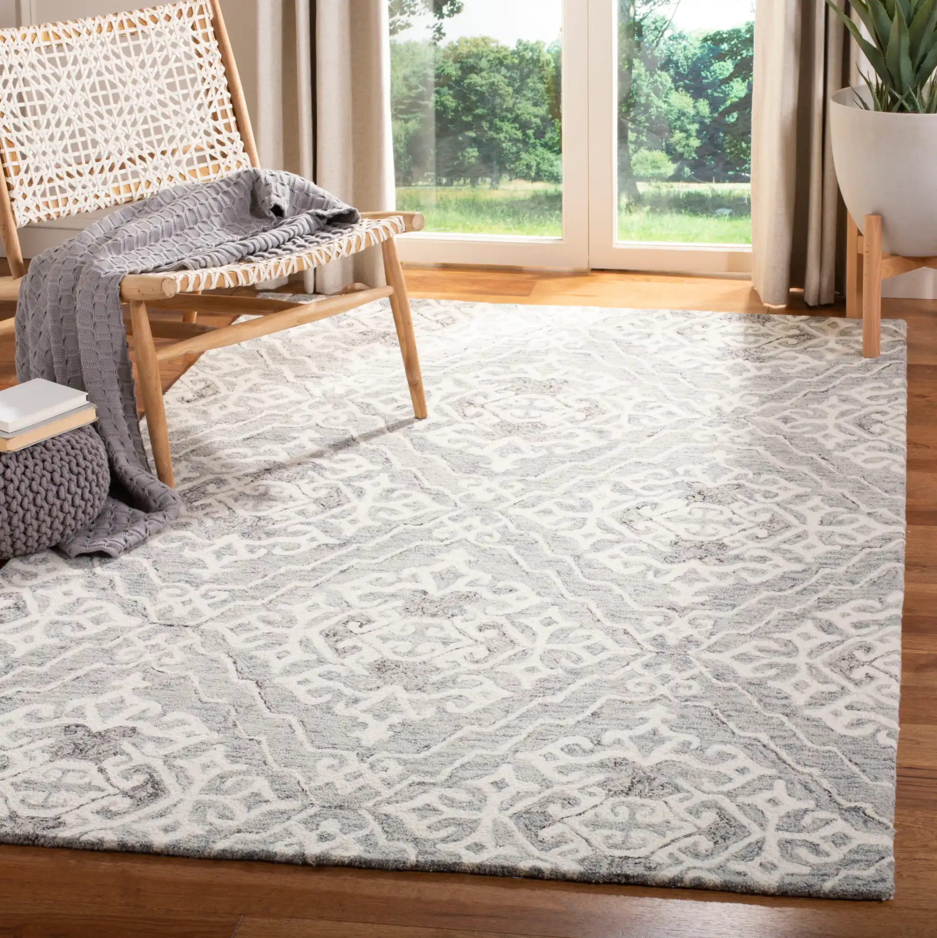 Micro-Loop Trellis Hand-Tufted Wool Rug in Gray / Ivory in a styled room