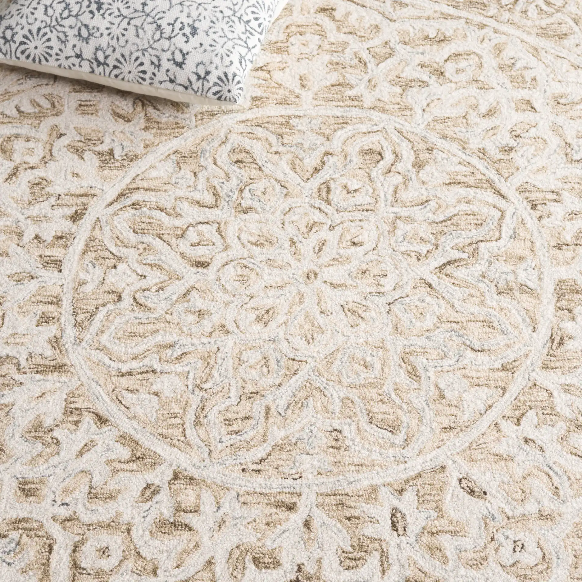 Micro-Loop Circular Medallion Hand-Tufted Wool Rug in Brown / Light Blue in a styled room