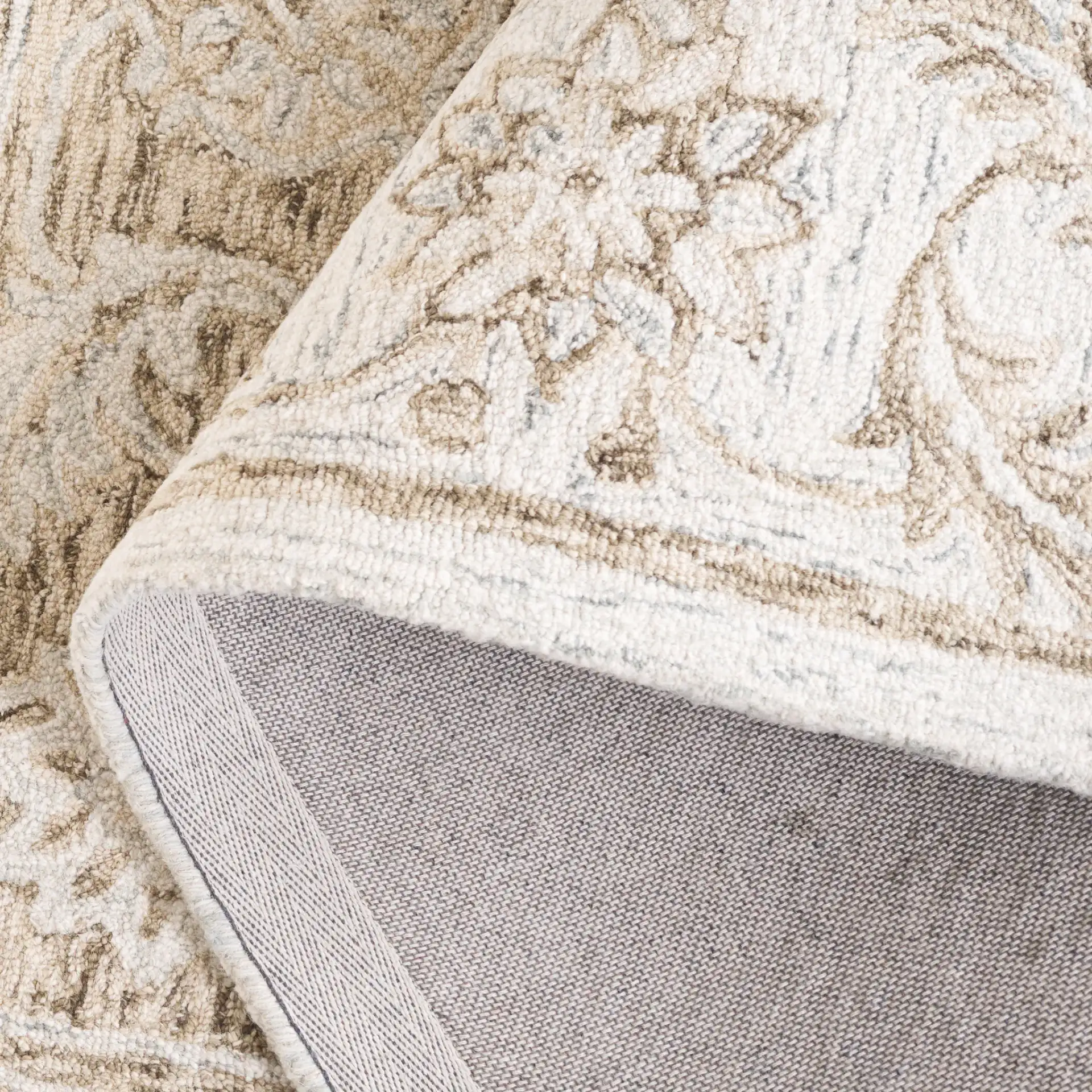 Micro-Loop Circular Medallion Hand-Tufted Wool Rug in Brown / Light Blue in a styled room