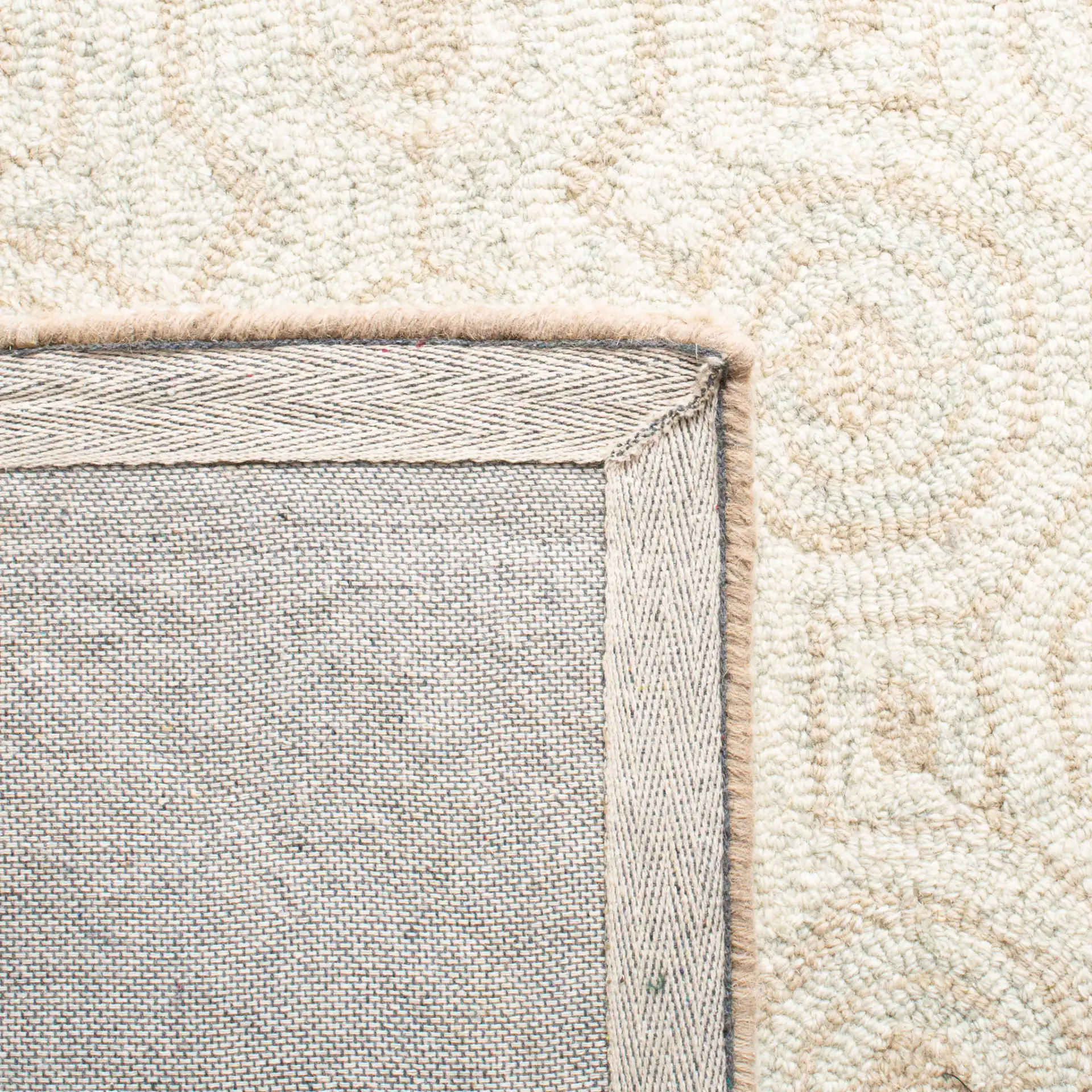 Micro-Loop Geometric Tile Hand-Tufted Wool Rug in Ivory / Light Green in a styled room