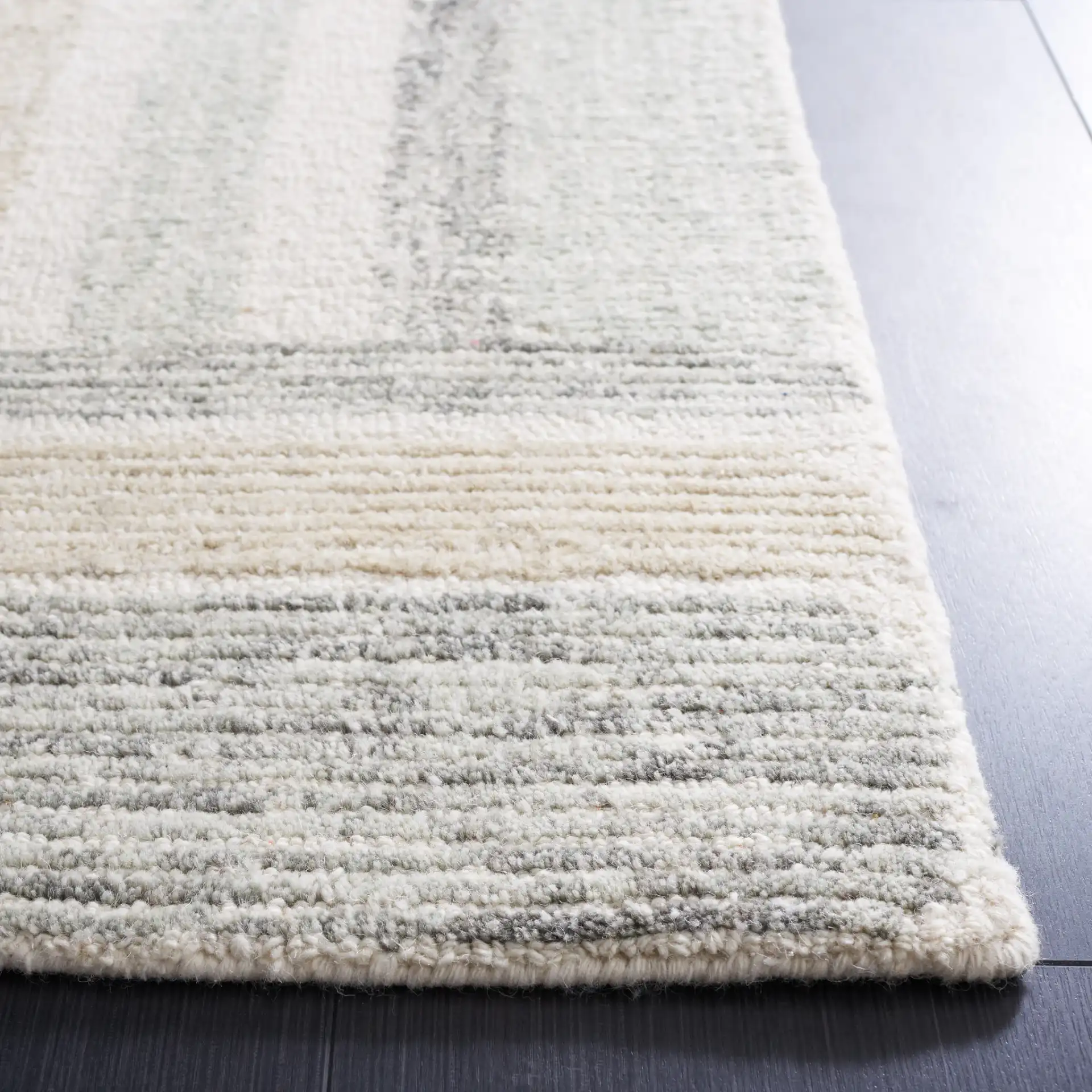 Micro-Loop Abstract Block Hand-Tufted Wool Rug in Ivory / Gray in a styled room