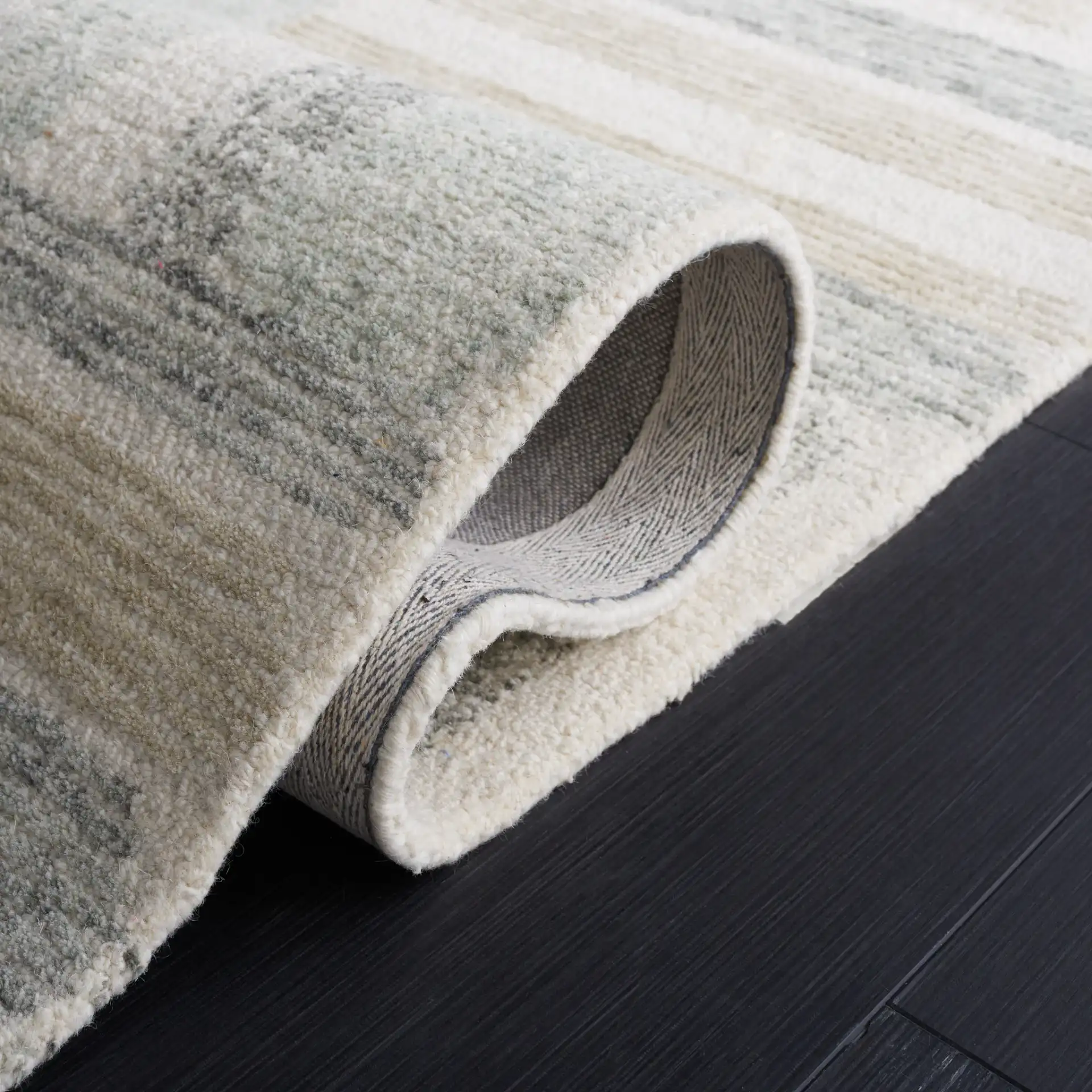 Micro-Loop Abstract Block Hand-Tufted Wool Rug in Ivory / Gray in a styled room