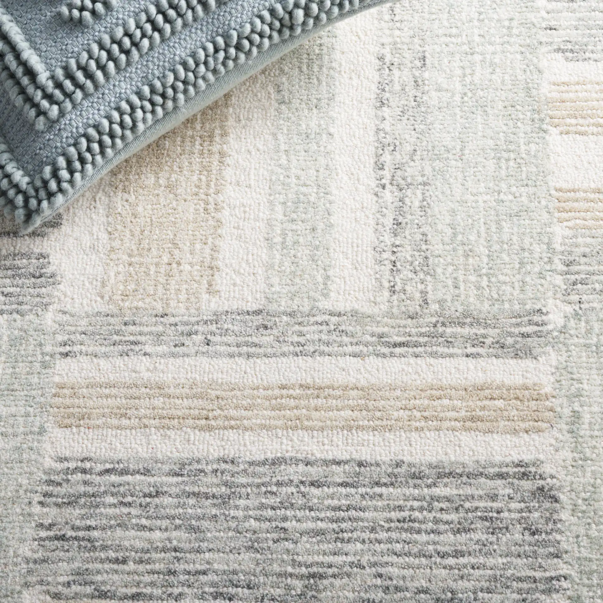 Micro-Loop Abstract Block Hand-Tufted Wool Rug in Ivory / Gray in a styled room