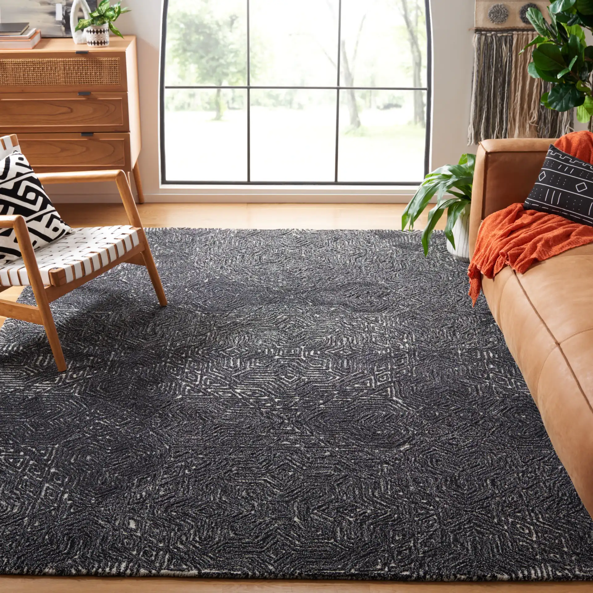 Micro-Loop Maze Hand-Tufted Wool Rug in Ivory / Black in a styled room