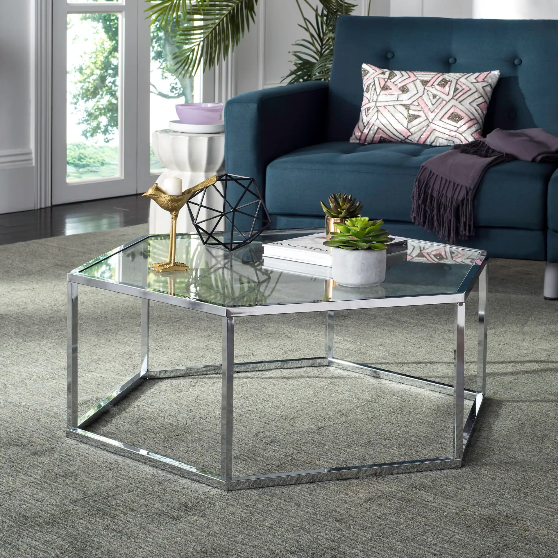 Eliana Coffee Table in Chrome in a styled room