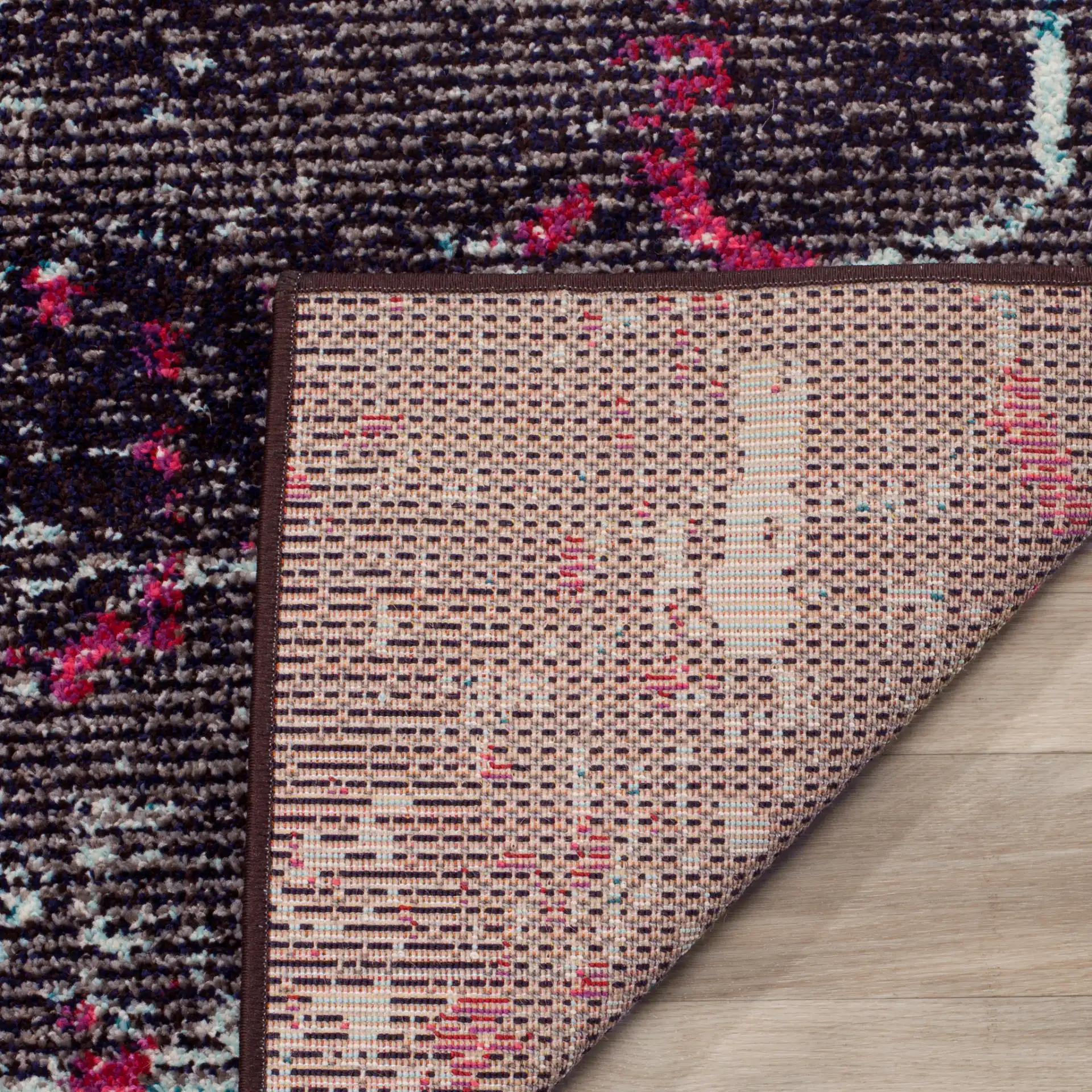 Monaco Overdyed Patchwork Rug in Pink / Multicolor in a styled room
