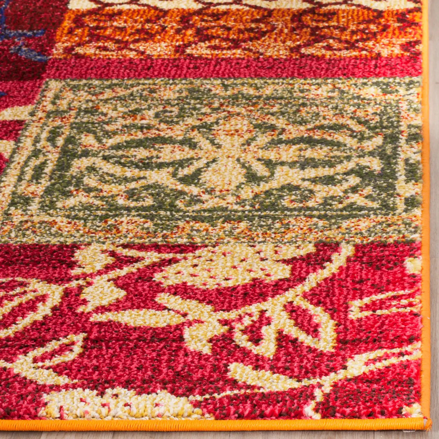 Monaco Patchwork Floral Rug in Multicolor in a styled room