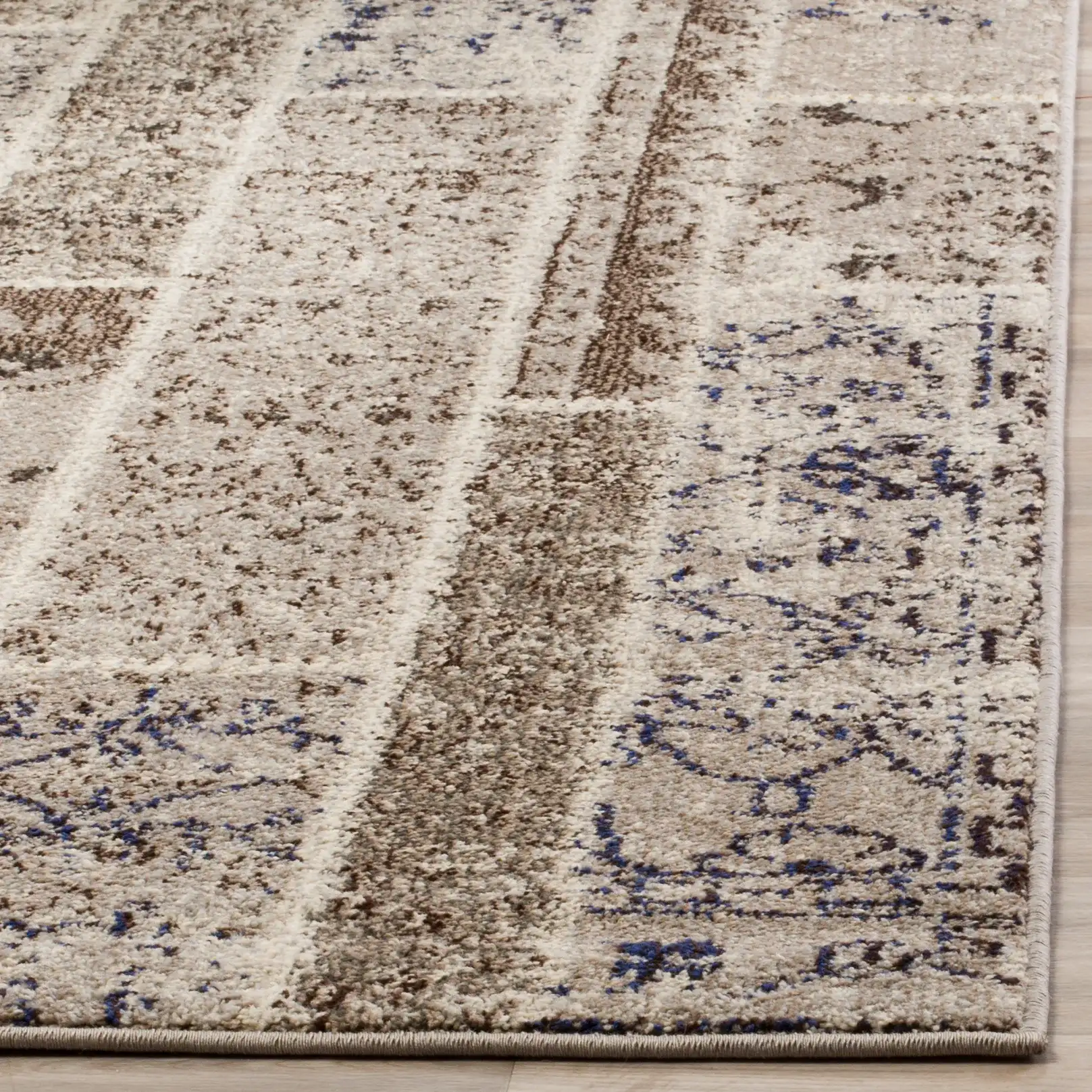 Monaco Distressed Patchwork Rug in Beige / Multicolor in a styled room