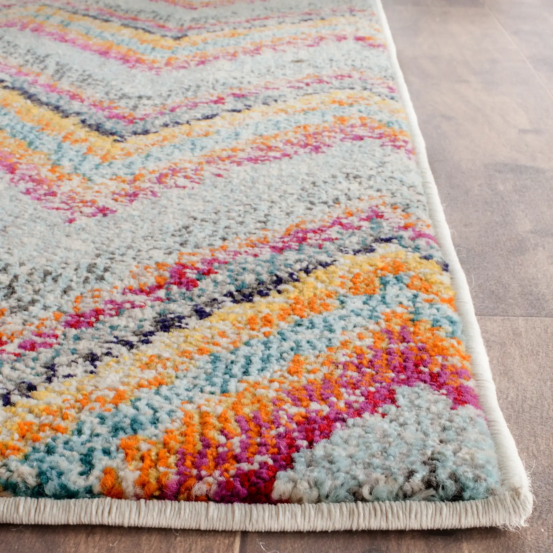 Monaco Zigzag Rug in Multicolor in a styled room