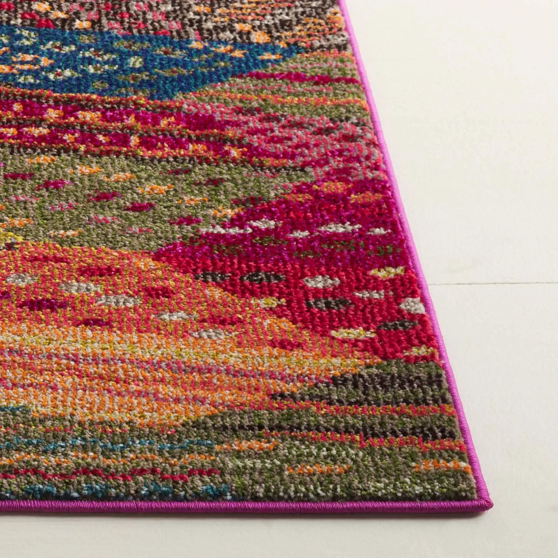 Monaco Patchwork Diamond Rug in Multicolor in a styled room