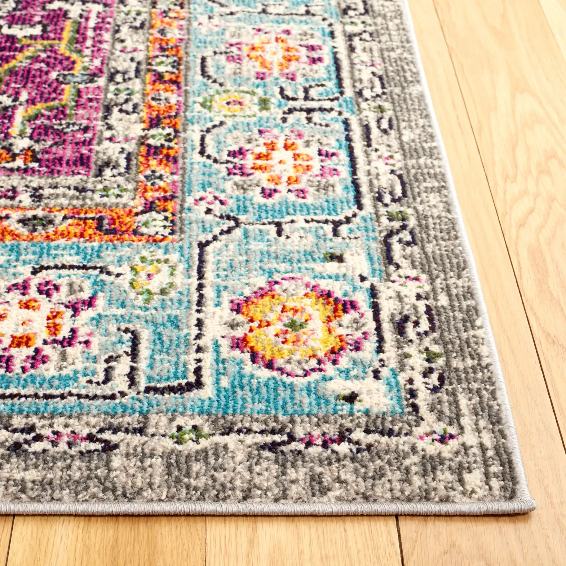 Monaco Medallion Bordered Rug in Violet / Light Blue in a styled room