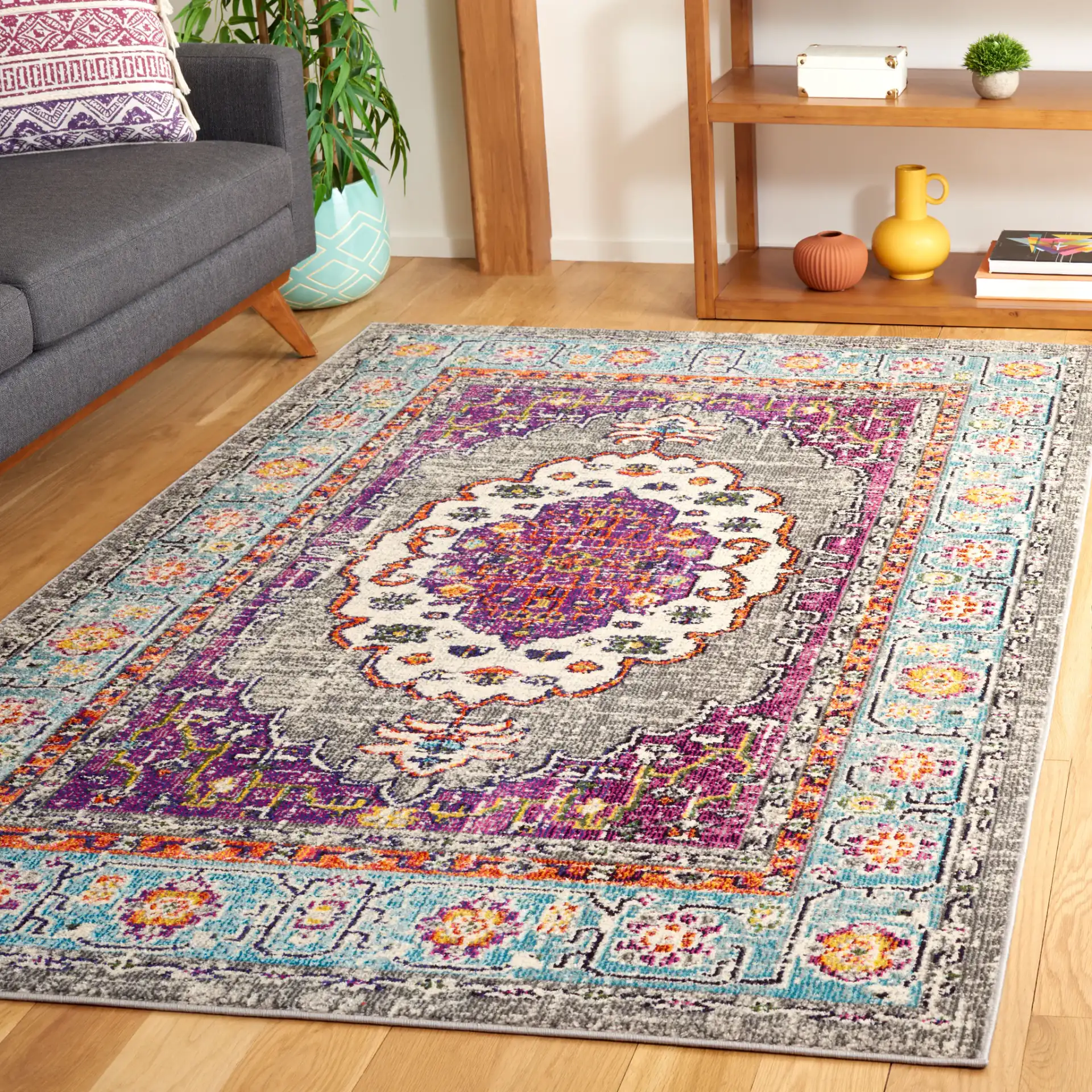 Monaco Medallion Bordered Rug in Violet / Light Blue in a styled room