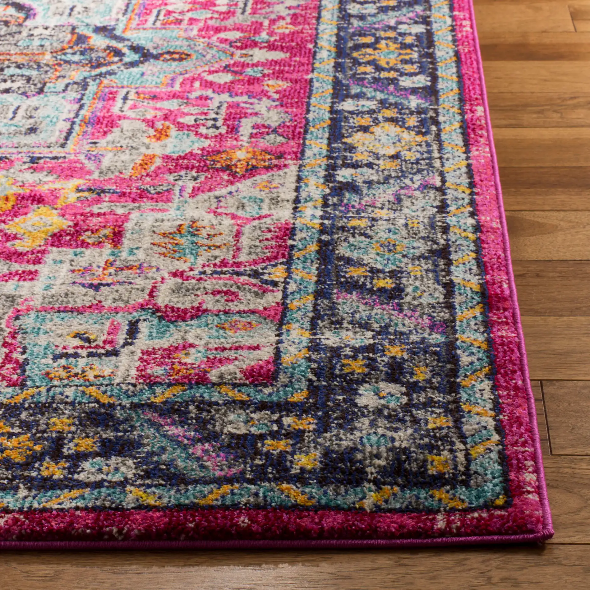 Monaco Square Medallion Bordered Rug in Fuchsia / Gray in a styled room