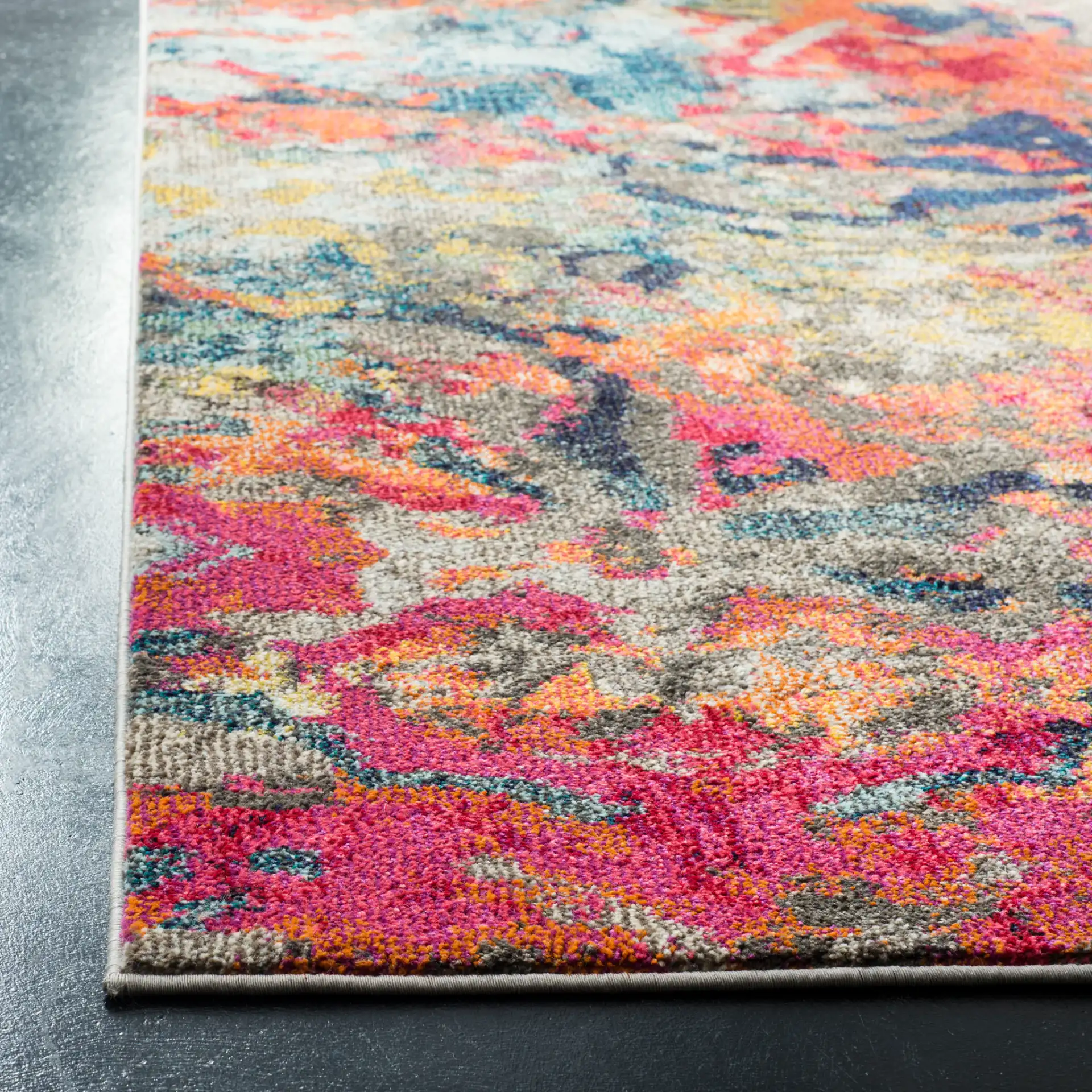 Monaco Abstract Splatter Rug in Blue / Orange in a styled room