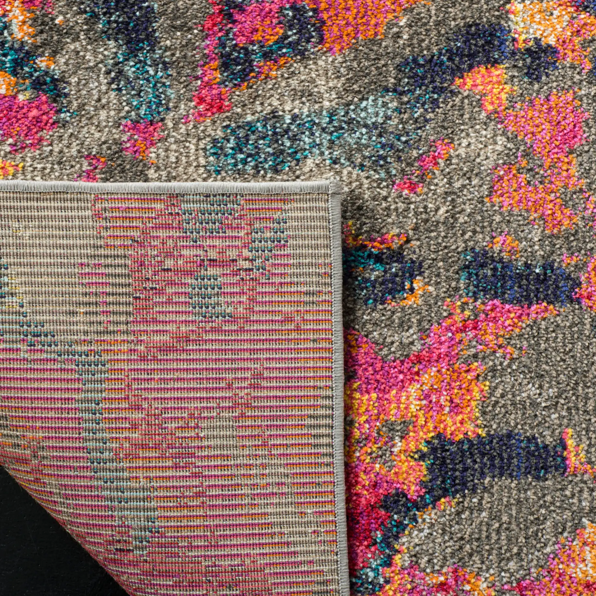 Monaco Abstract Splatter Rug in Blue / Orange in a styled room