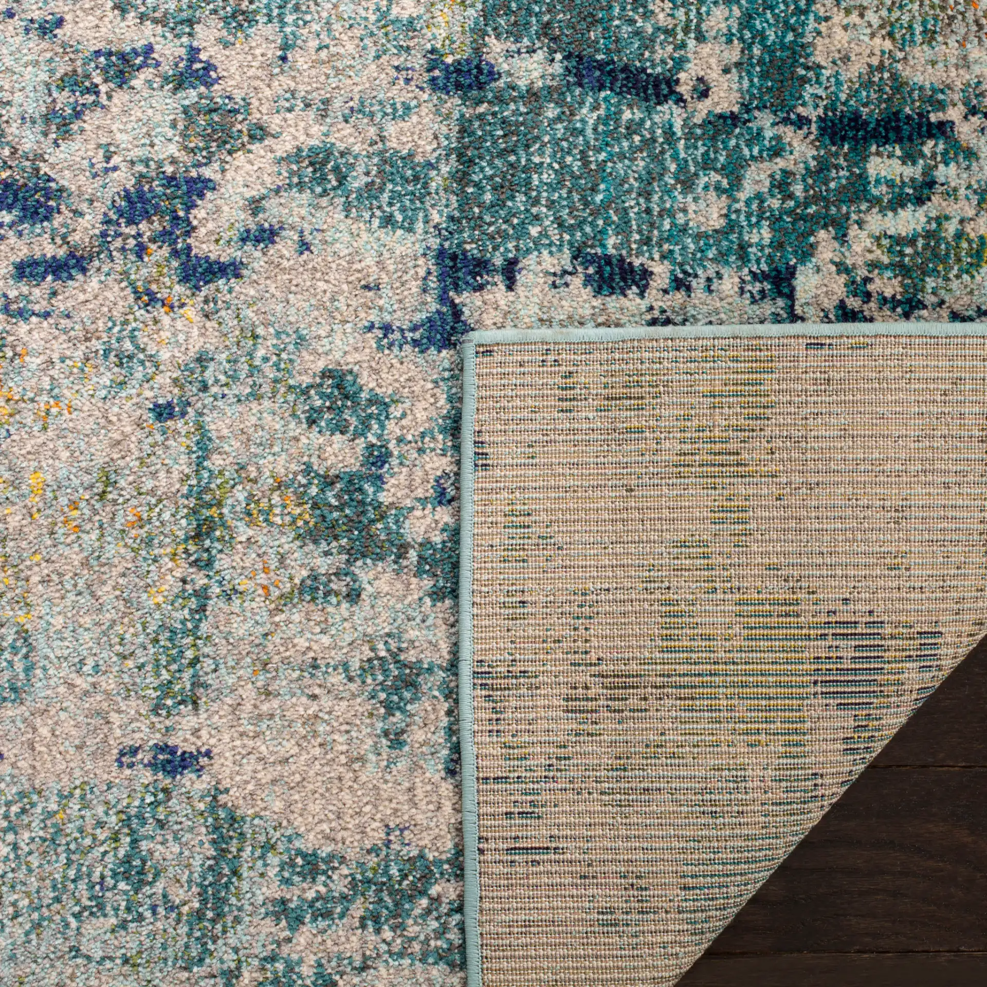 Monaco Horizontal Abstract Rug in Blue / Gray in a styled room