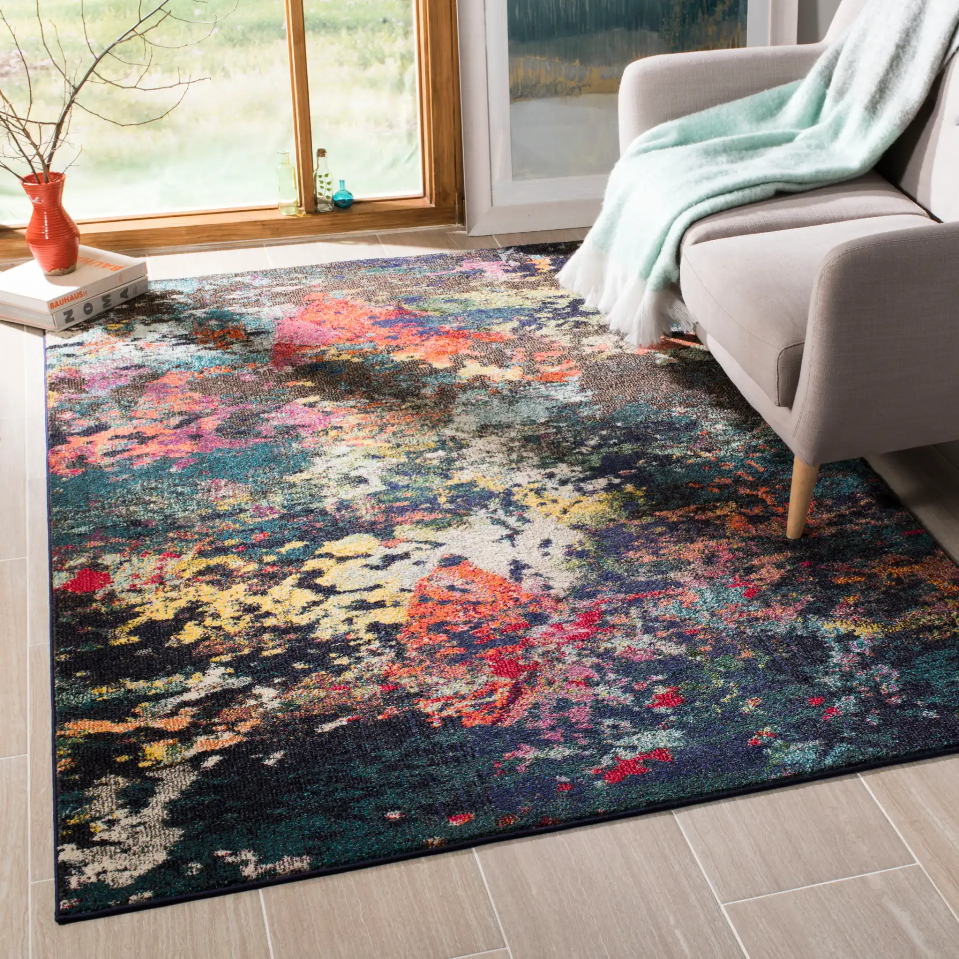 Monaco Abstract Mottled Rug in Brown / Teal in a styled room