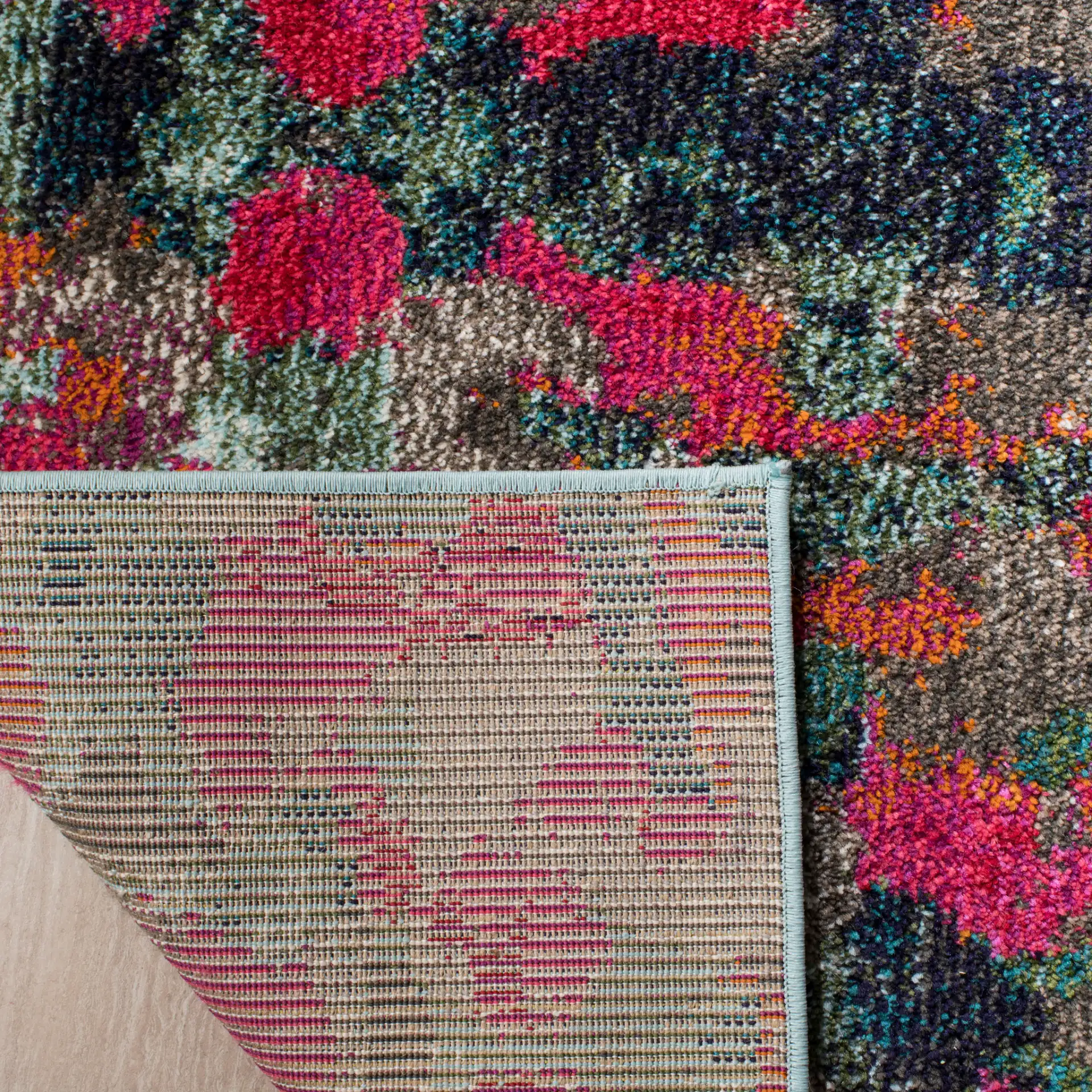 Monaco Blurred Abstract Rug in Green / Blue in a styled room