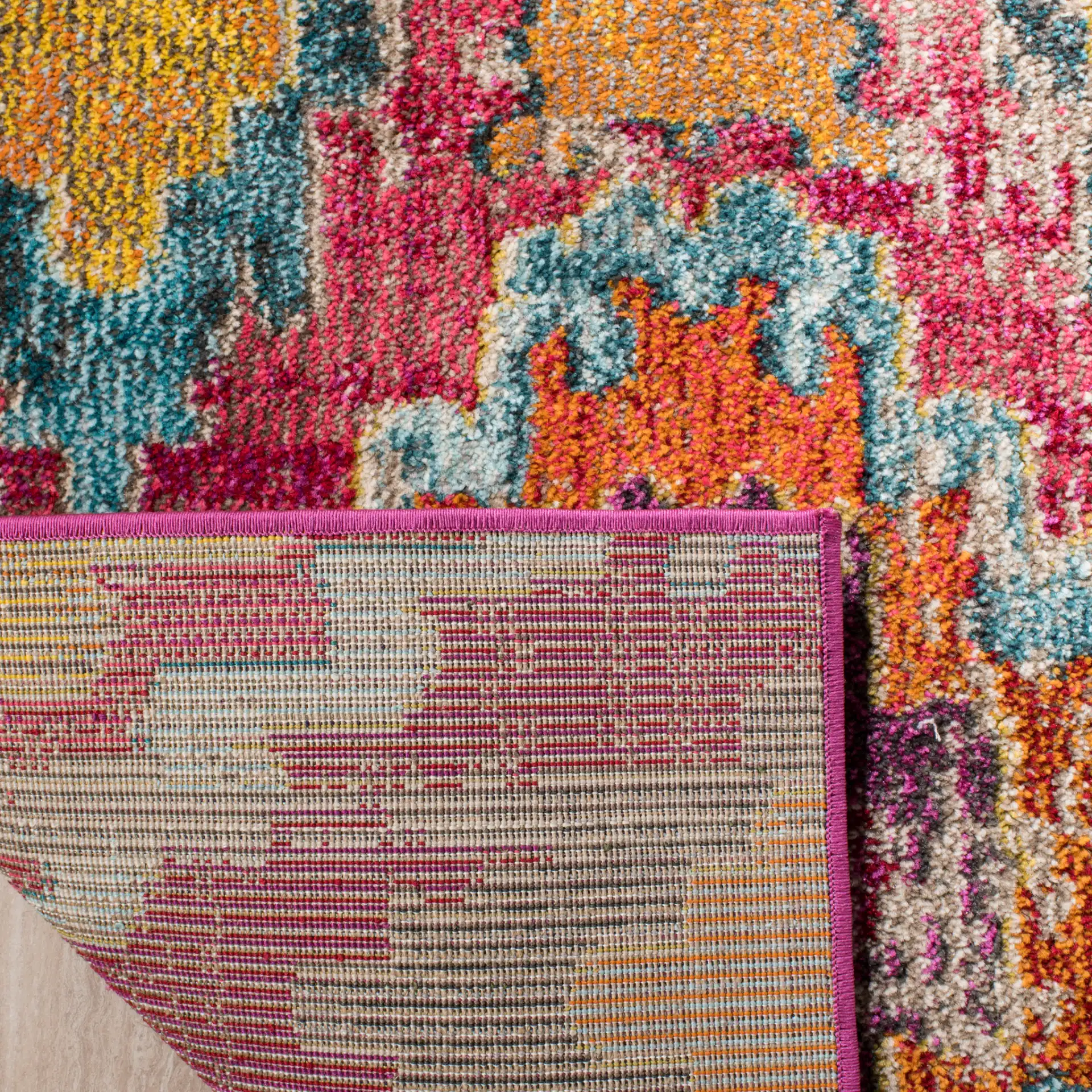 Monaco Stepped Diamond Rug in Red / Blue in a styled room