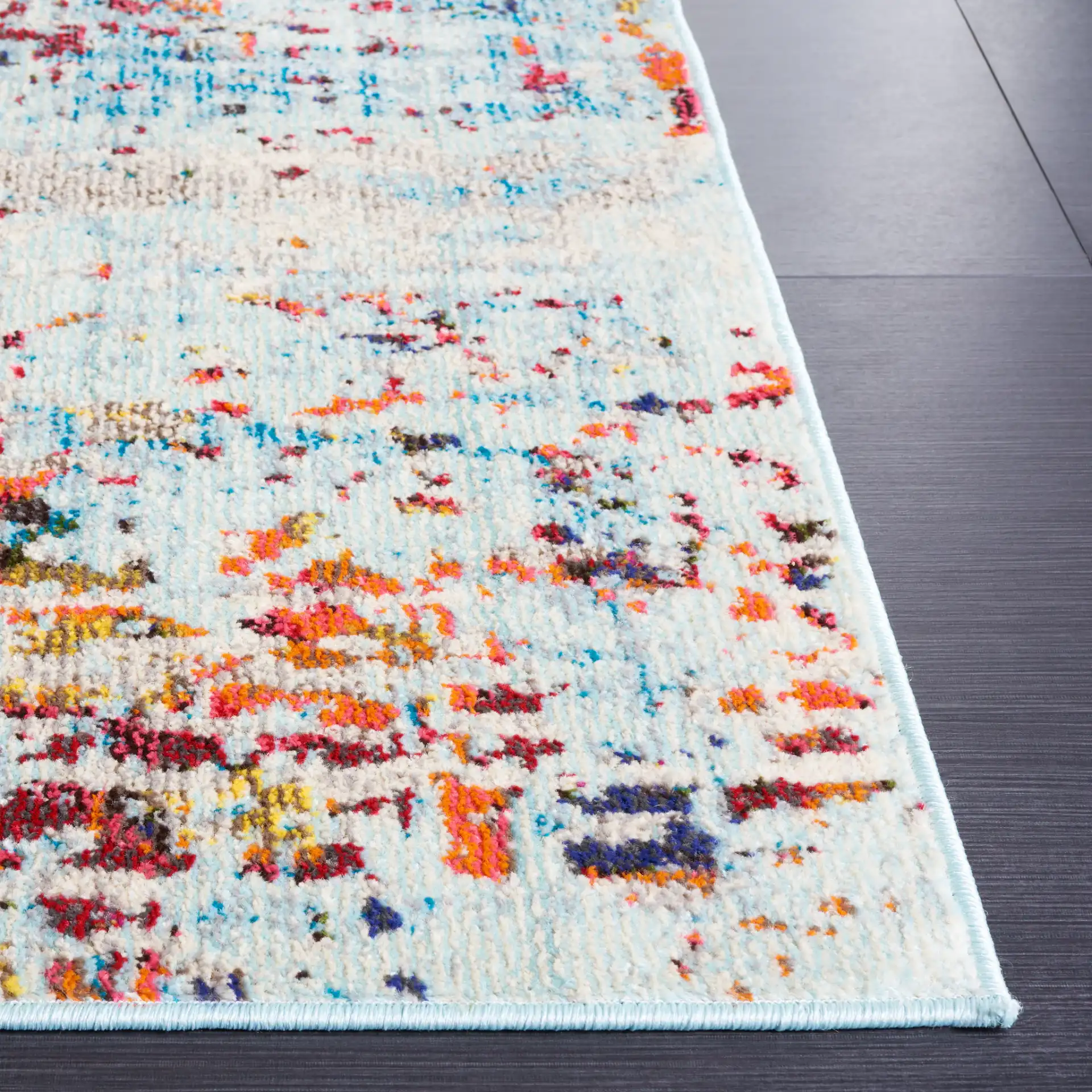 Monaco Abstract Striation Rug in Gray / Multicolor in a styled room