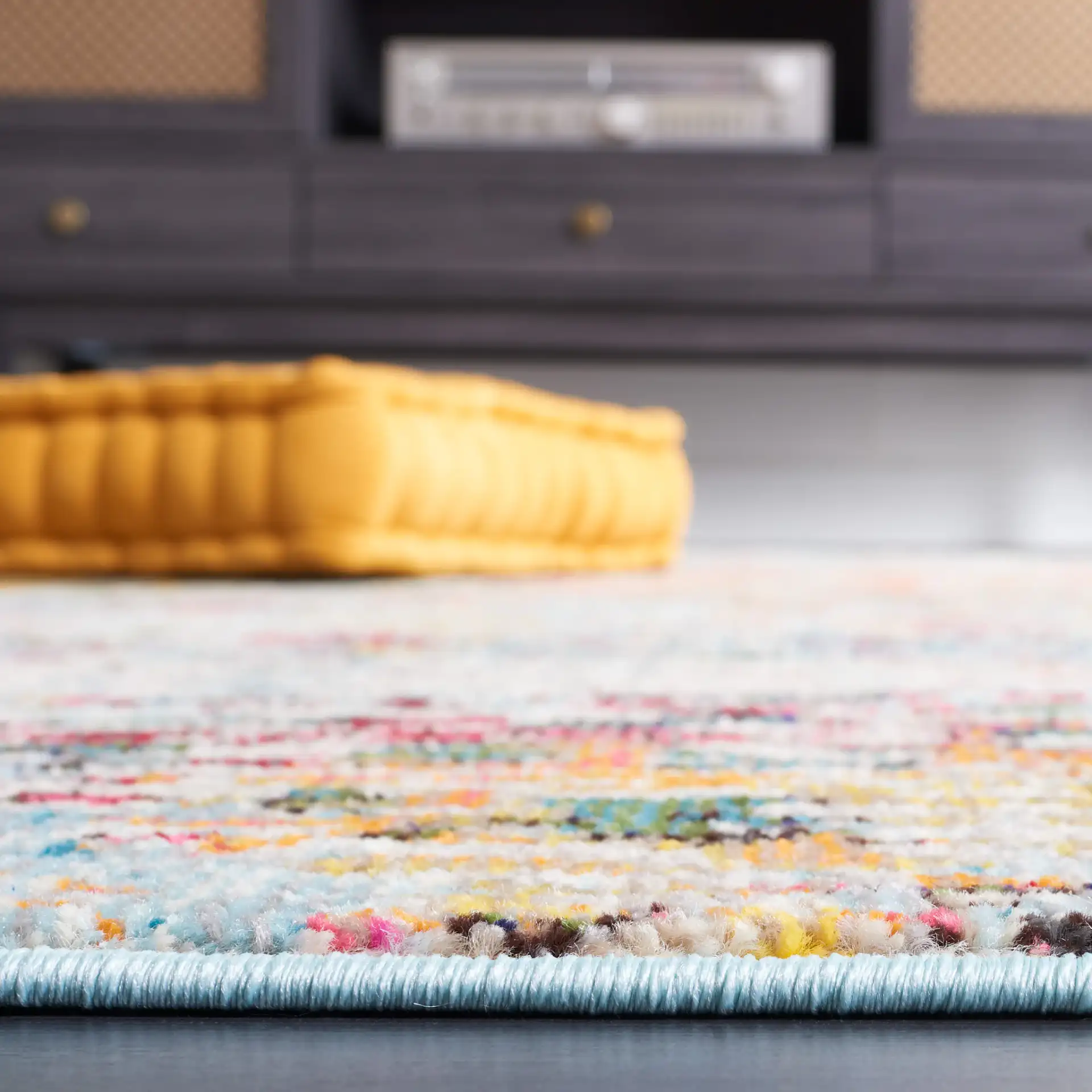 Monaco Abstract Striation Rug in Gray / Multicolor in a styled room