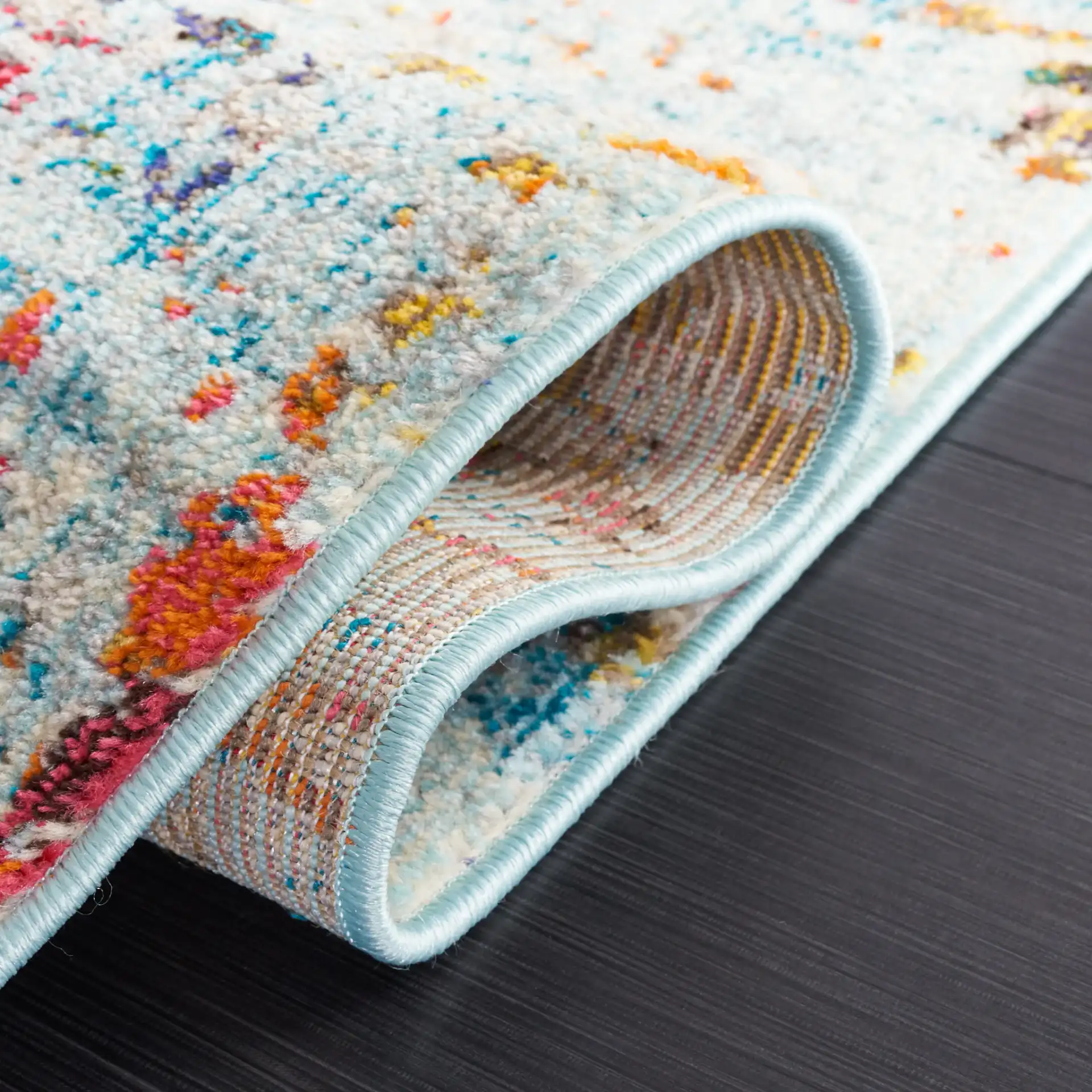 Monaco Abstract Striation Rug in Gray / Multicolor in a styled room