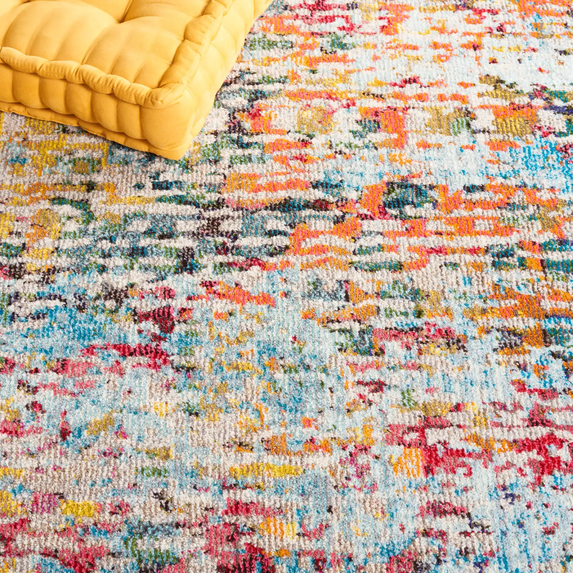 Monaco Abstract Striation Rug in Gray / Multicolor in a styled room