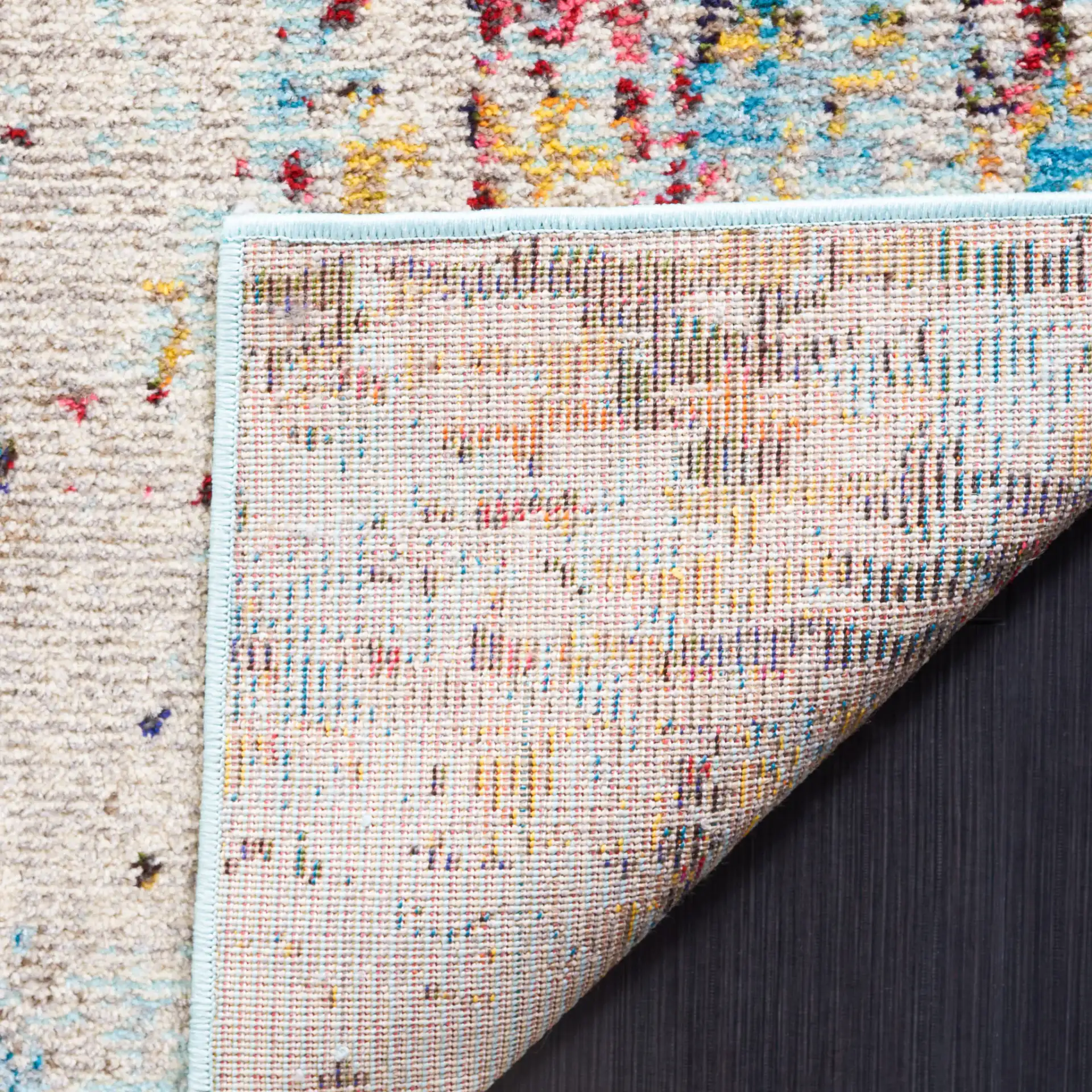 Monaco Abstract Striation Rug in Gray / Multicolor in a styled room