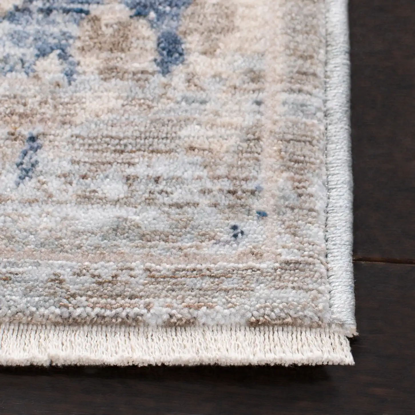 Moondust Distressed Allover Rug in Gray / Ivory in a styled room
