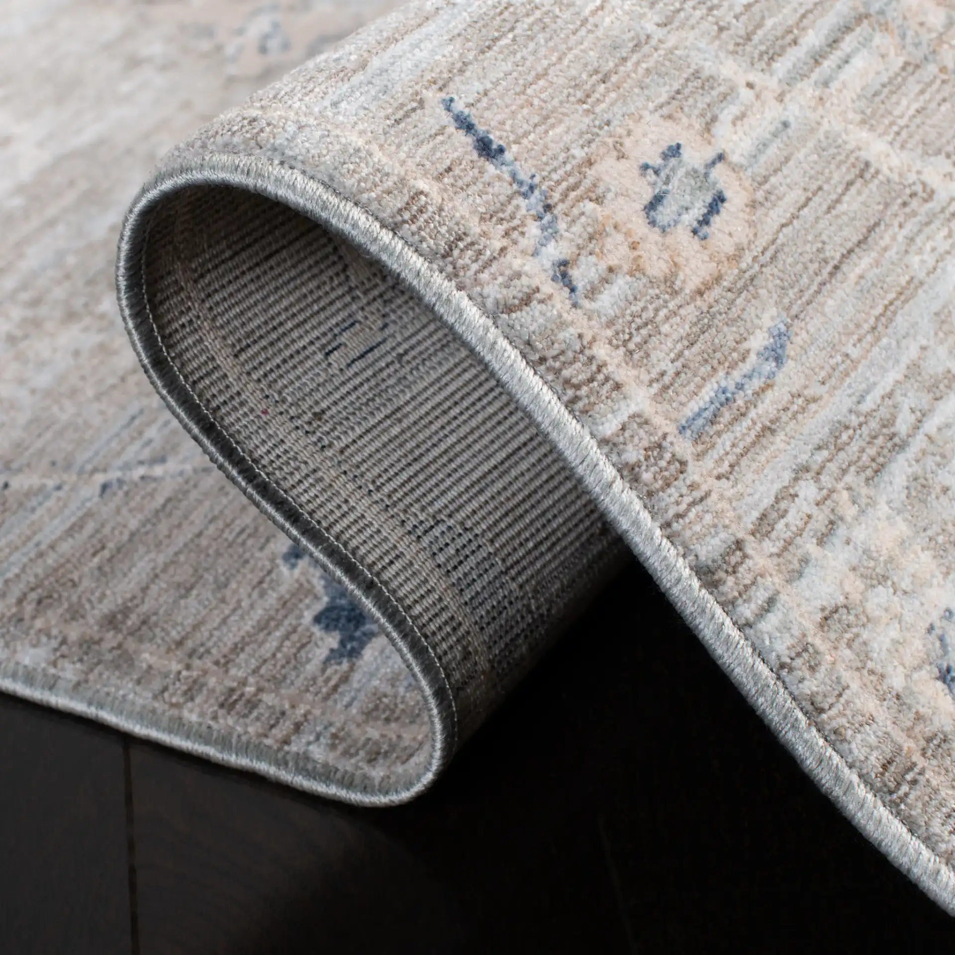 Moondust Distressed Allover Rug in Gray / Ivory in a styled room