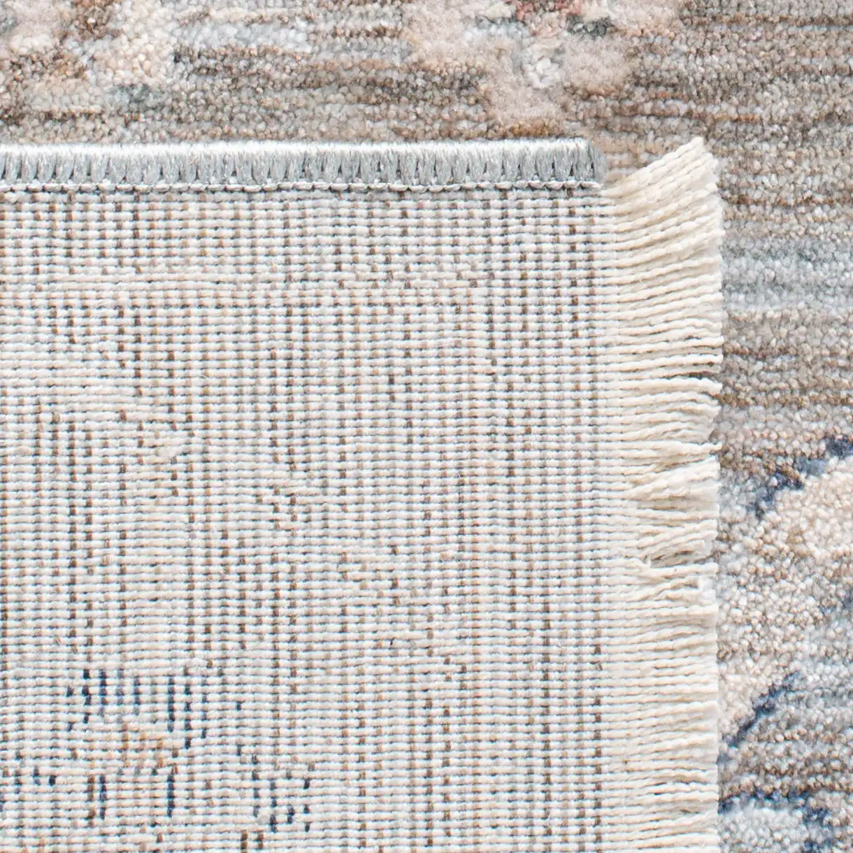 Moondust Distressed Allover Rug in Gray / Ivory in a styled room