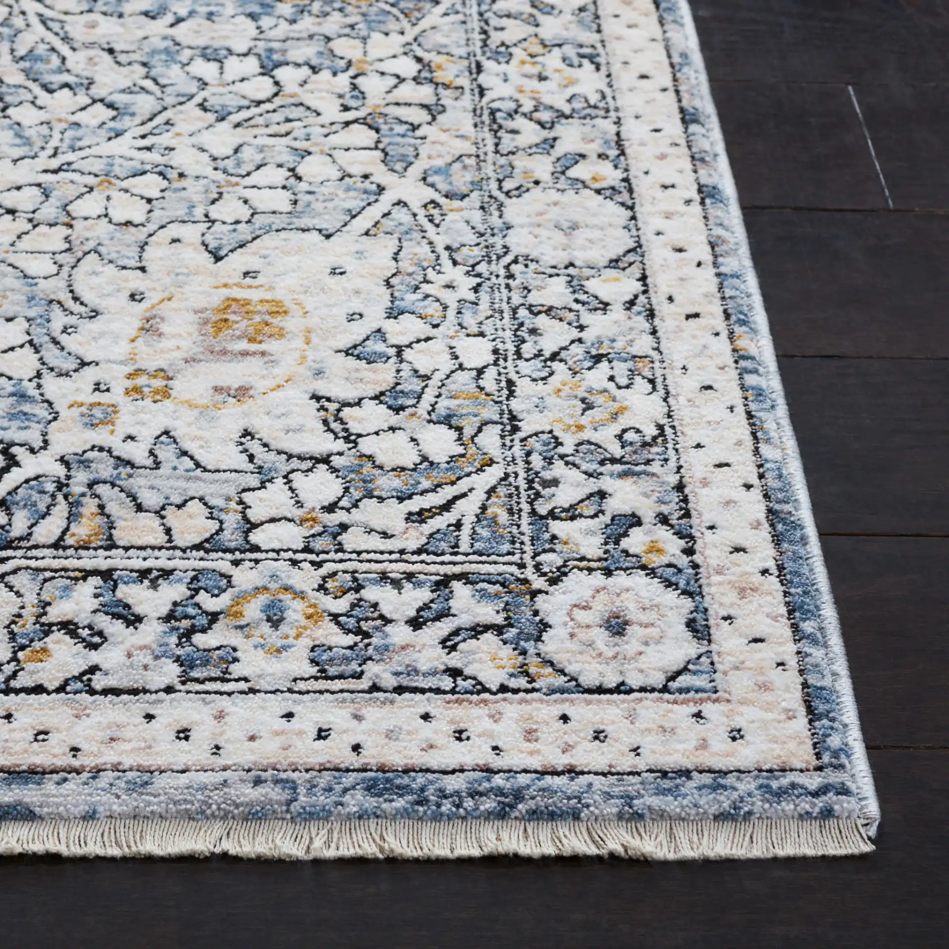 Moondust Floral Bordered Rug in Ivory / Gray in a styled room