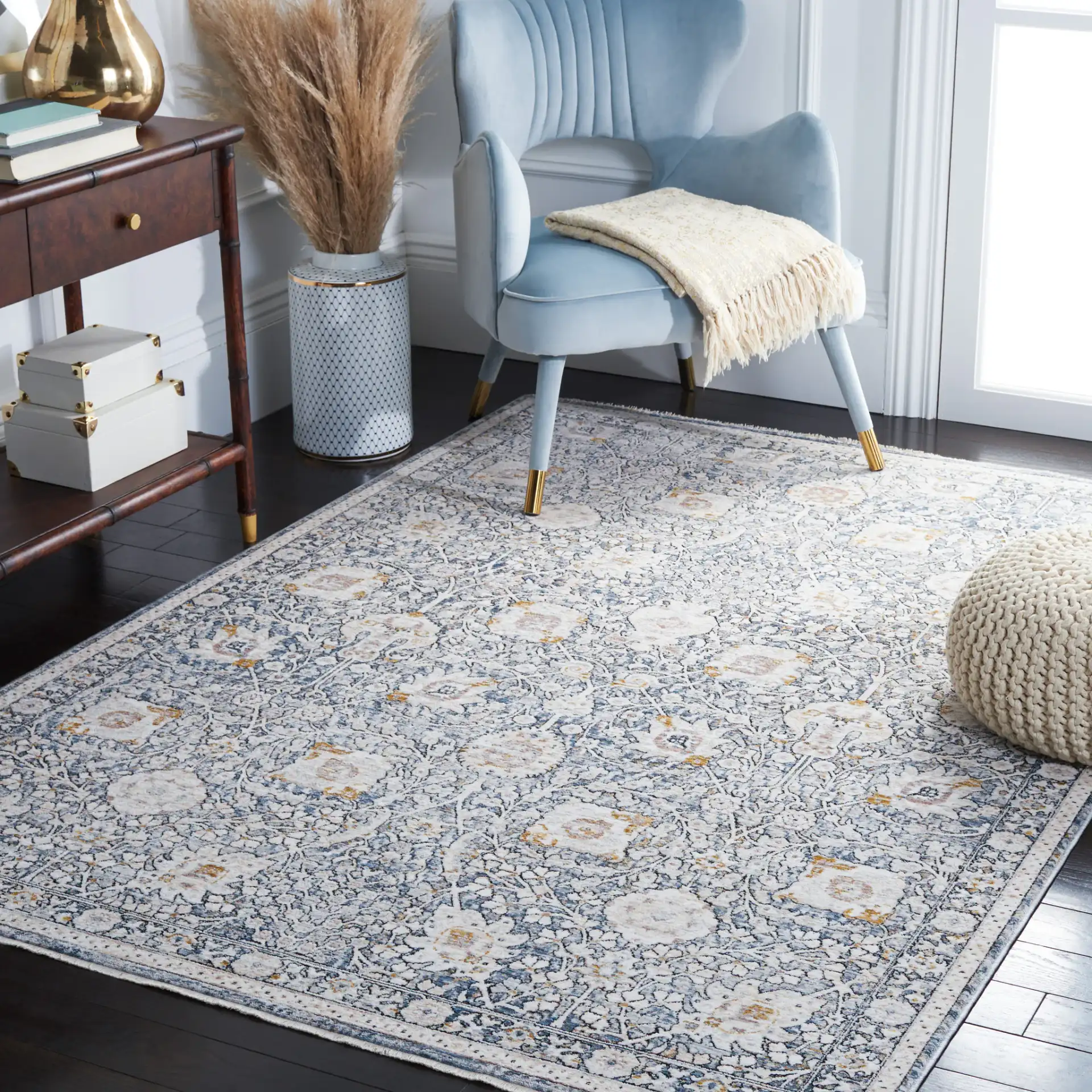 Moondust Floral Bordered Rug in Ivory / Gray in a styled room