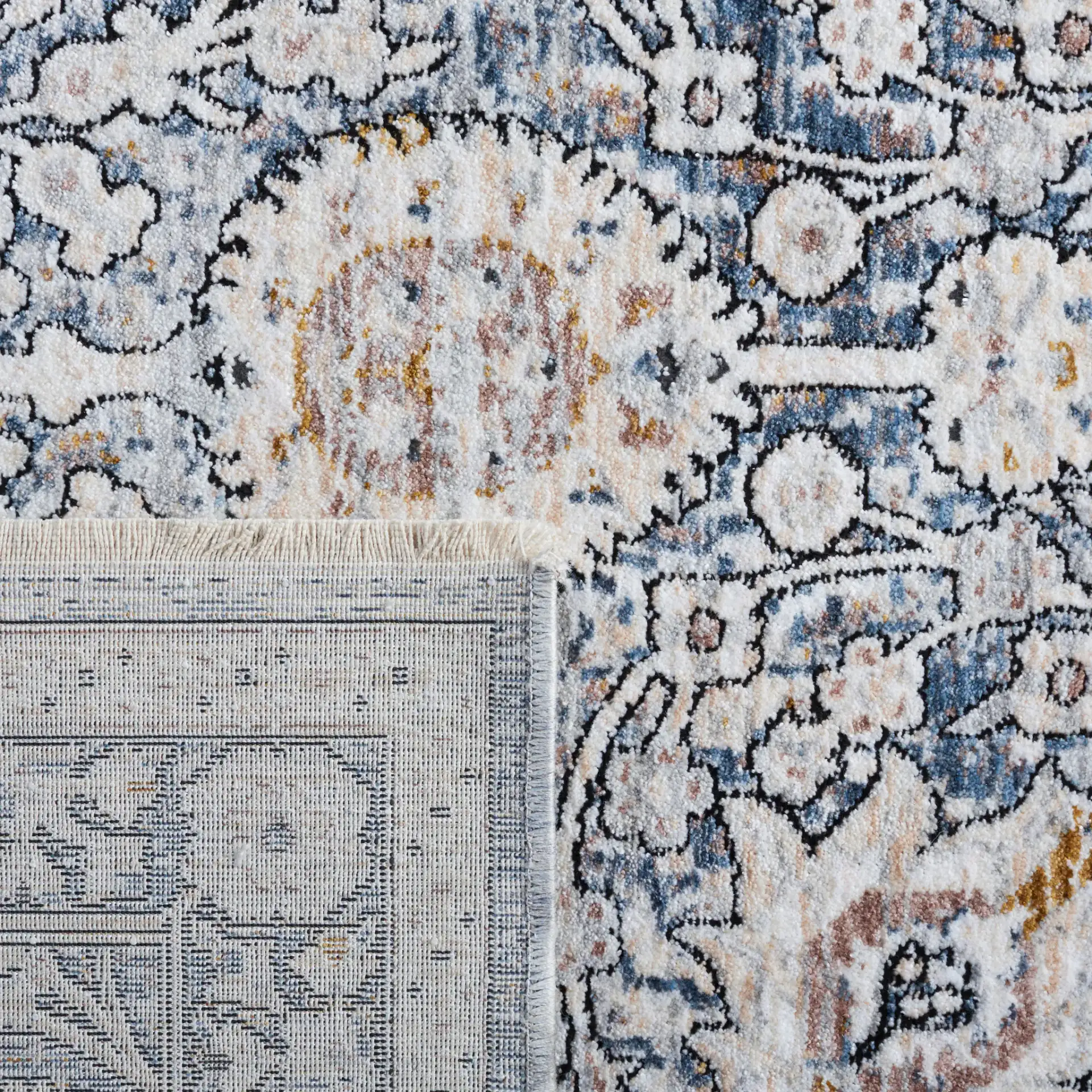 Moondust Floral Bordered Rug in Ivory / Gray in a styled room