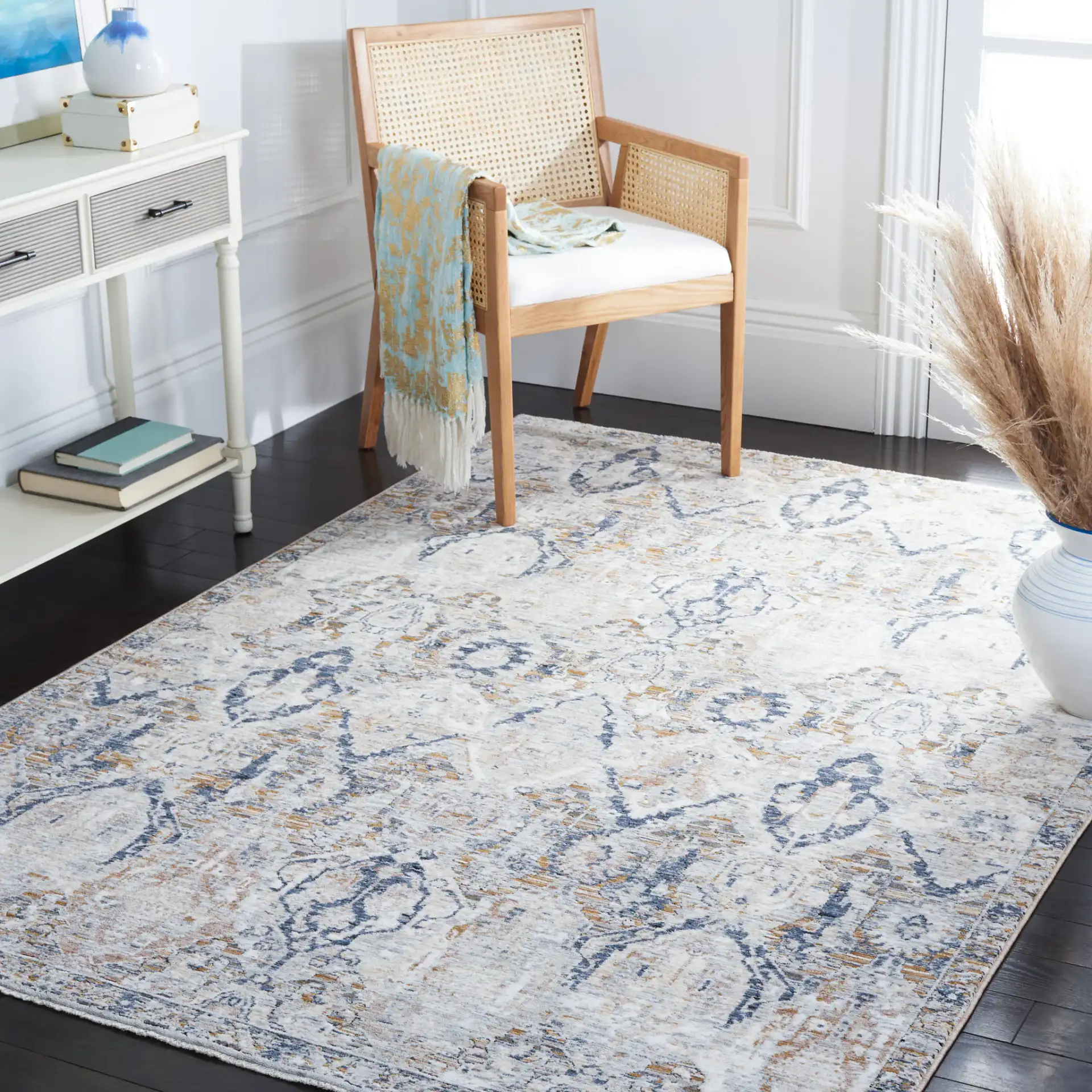 Moondust Distressed Damask Rug in Gray / Blue in a styled room