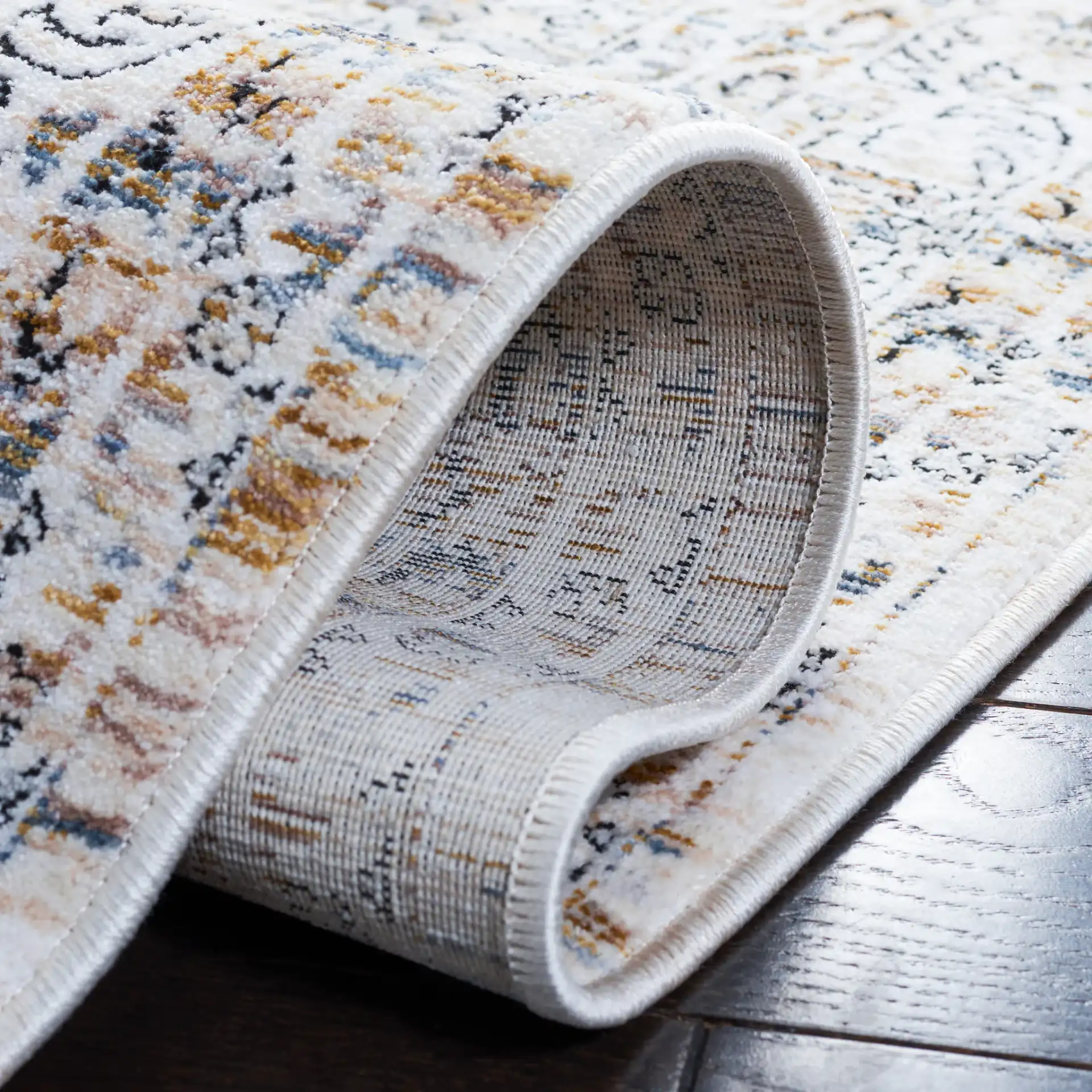 Moondust Bordered Floral Rug in Ivory / Gray in a styled room