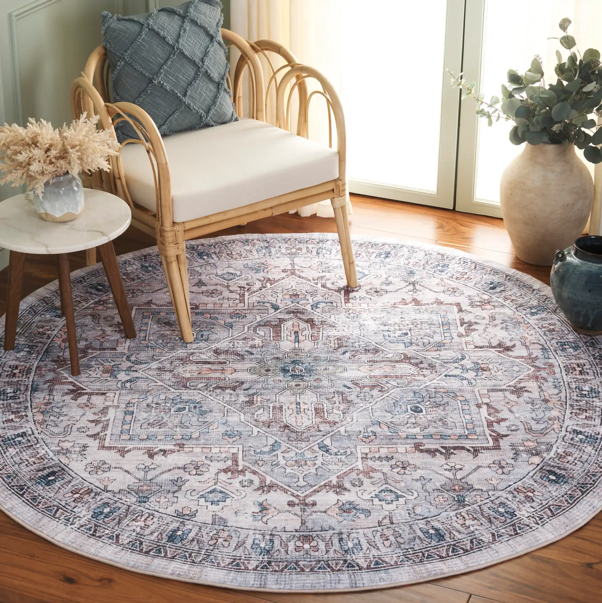 Montana Medallion Bordered Rug in Gray / Blue in a styled room