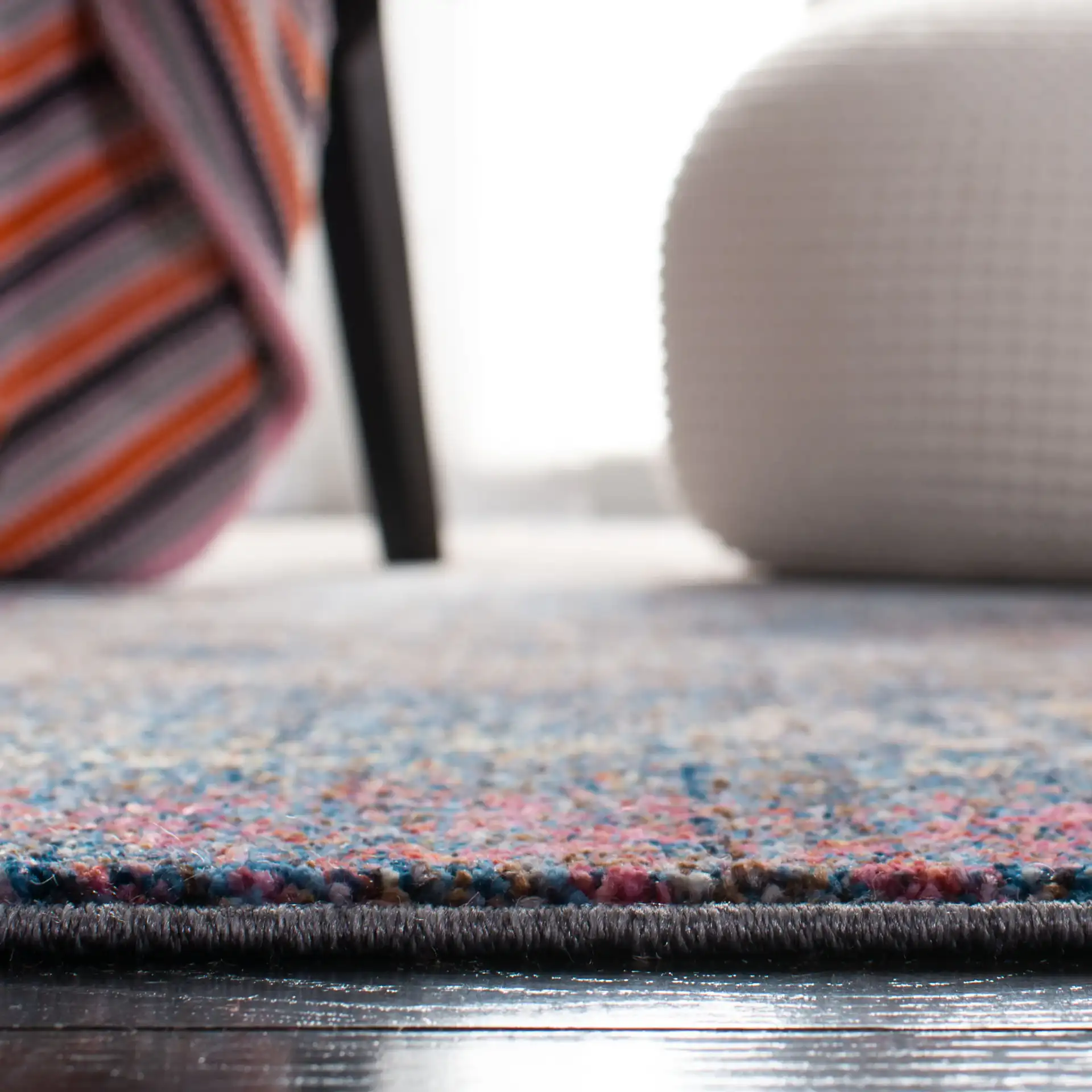 Monray Painterly Abstract Rug in Blue / Multicolor in a styled room