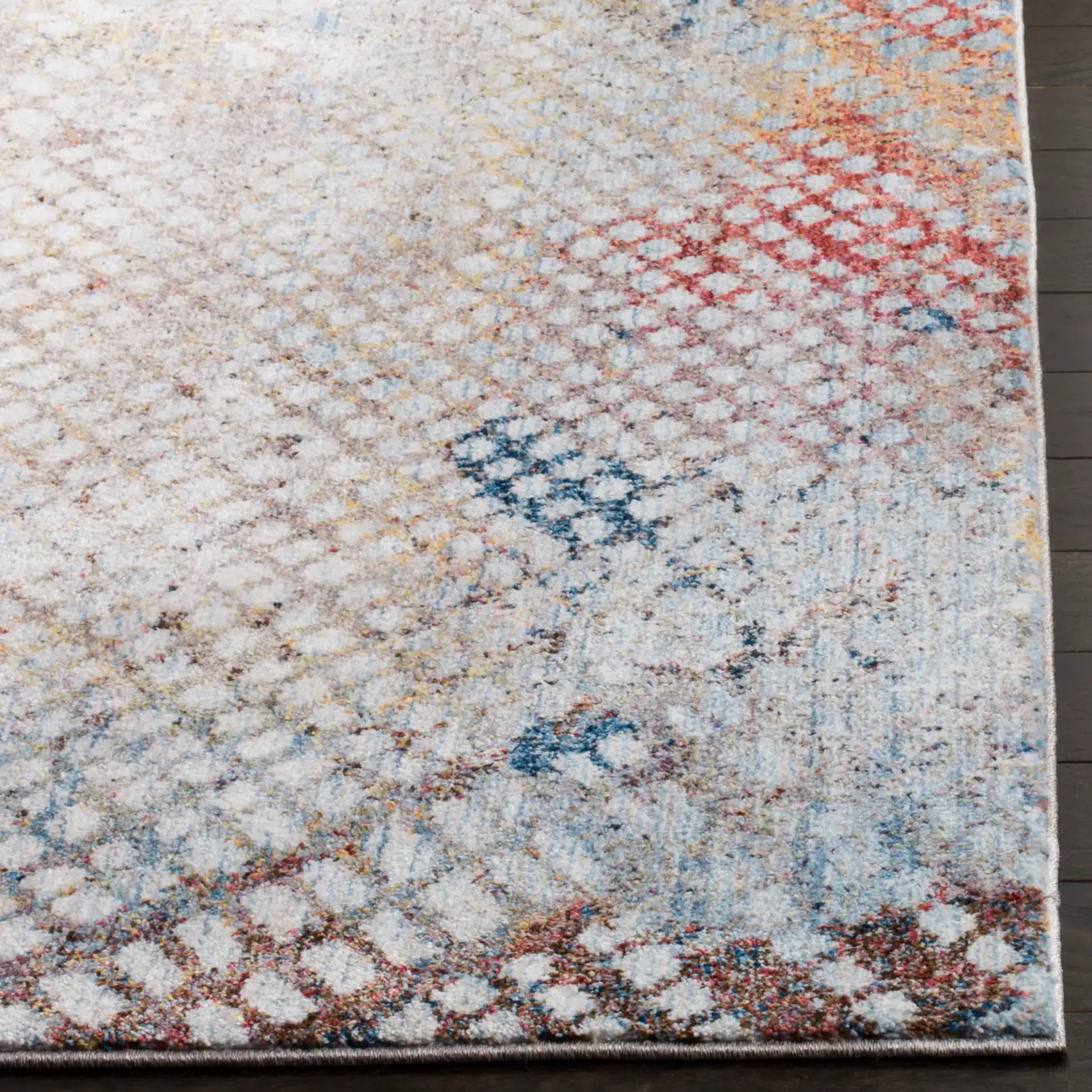 Monray Distressed Grid Rug in Gray / Gold in a styled room
