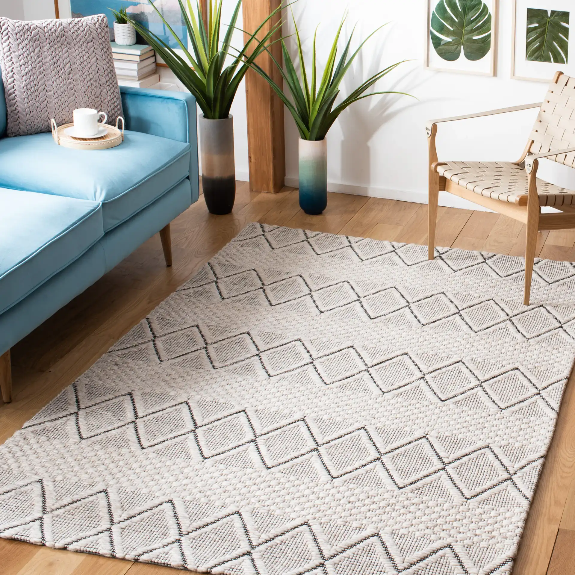 Marbella Banded Diamond Hand-Woven Wool Rug in Silver / Black in a styled room