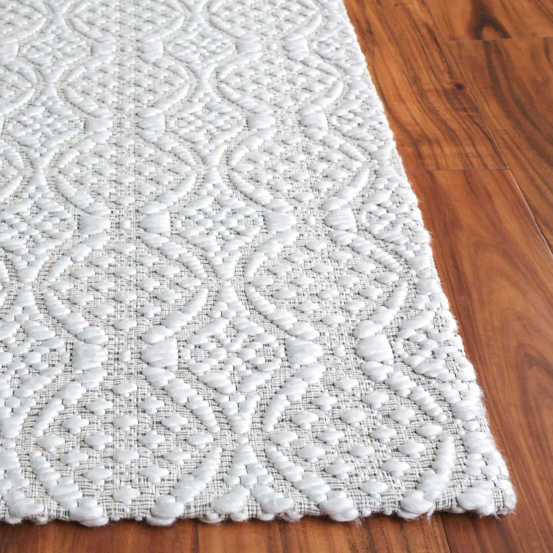 Marbella Interlocking Circles Hand-Woven Rug in Ivory in a styled room